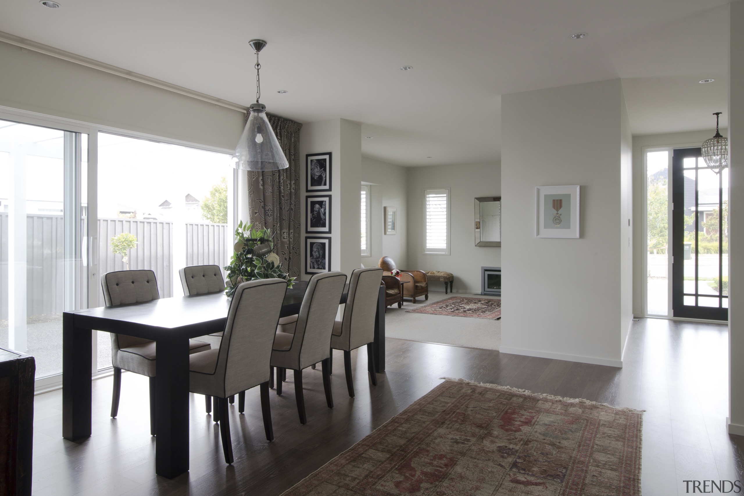 Landmark Homes show home at Karaka Lakes - dining room, floor, flooring, house, interior design, living room, property, real estate, room, table, window, gray, white