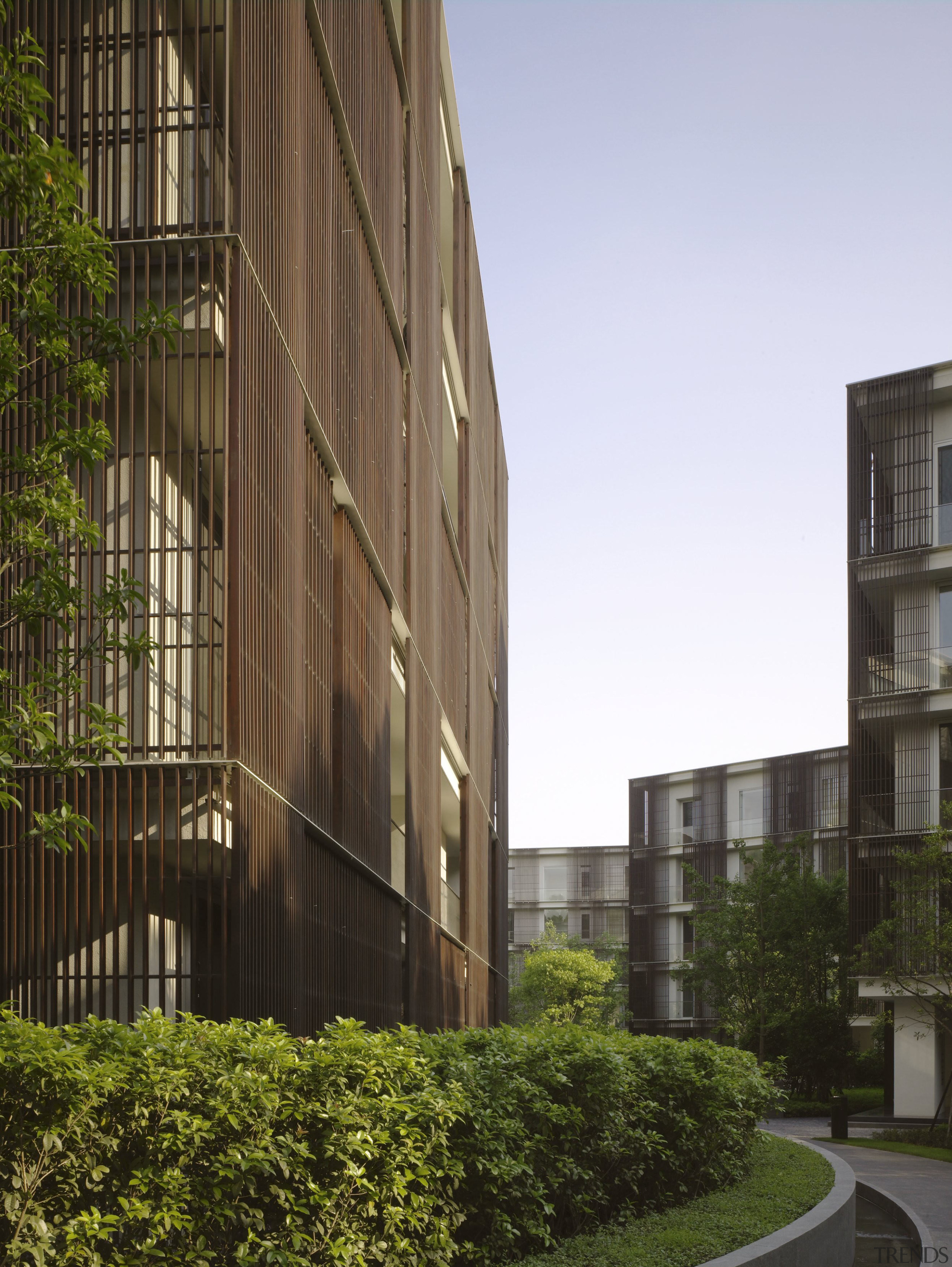 Exterior view of an apartment building which features apartment, architecture, building, commercial building, condominium, corporate headquarters, daytime, estate, facade, headquarters, home, house, metropolis, metropolitan area, mixed use, neighbourhood, real estate, residential area, tower block, urban design, black, brown, white