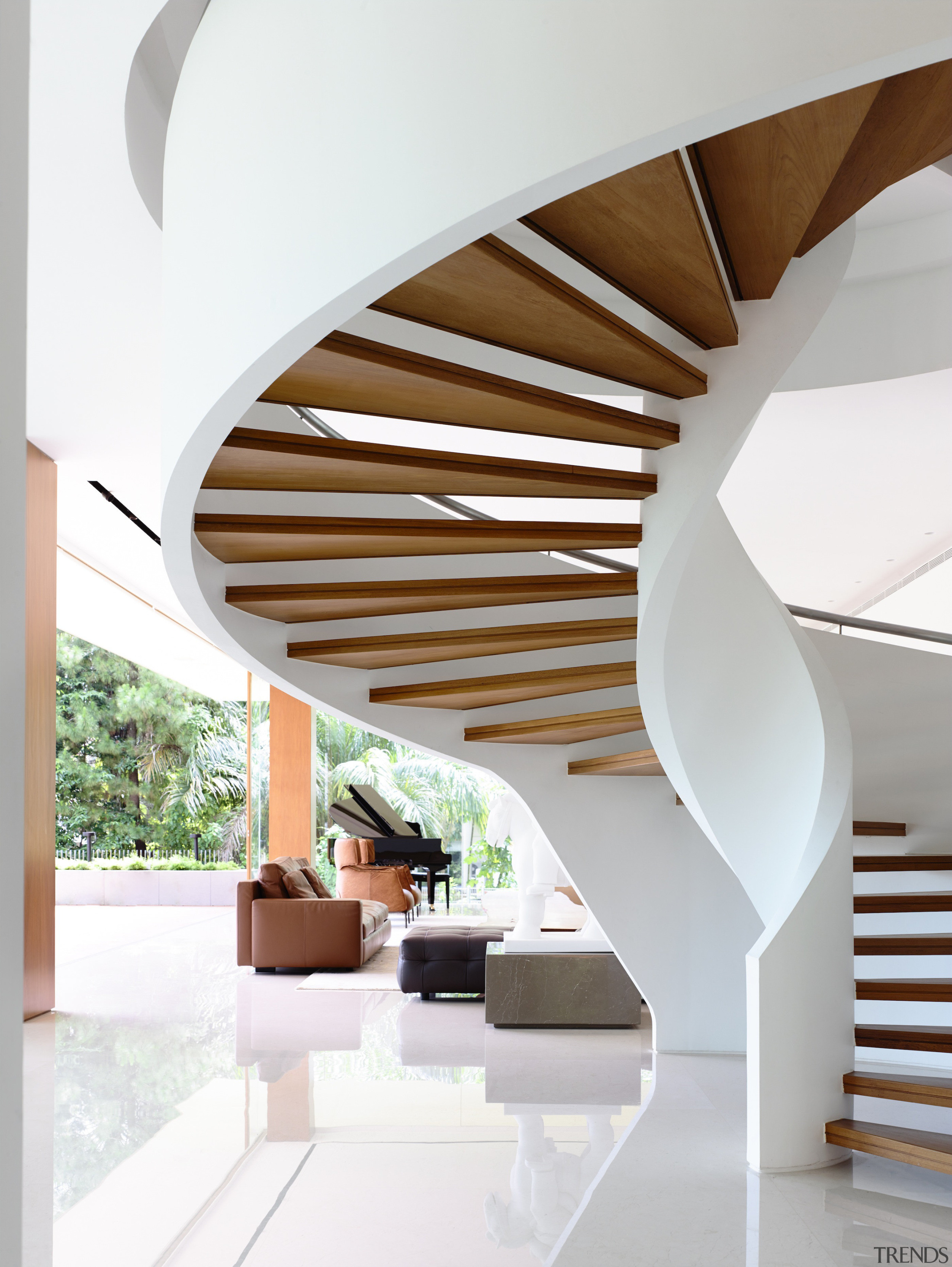 A sculptural staircase is a defining part of architecture, ceiling, daylighting, estate, home, house, interior design, product design, stairs, wood, white