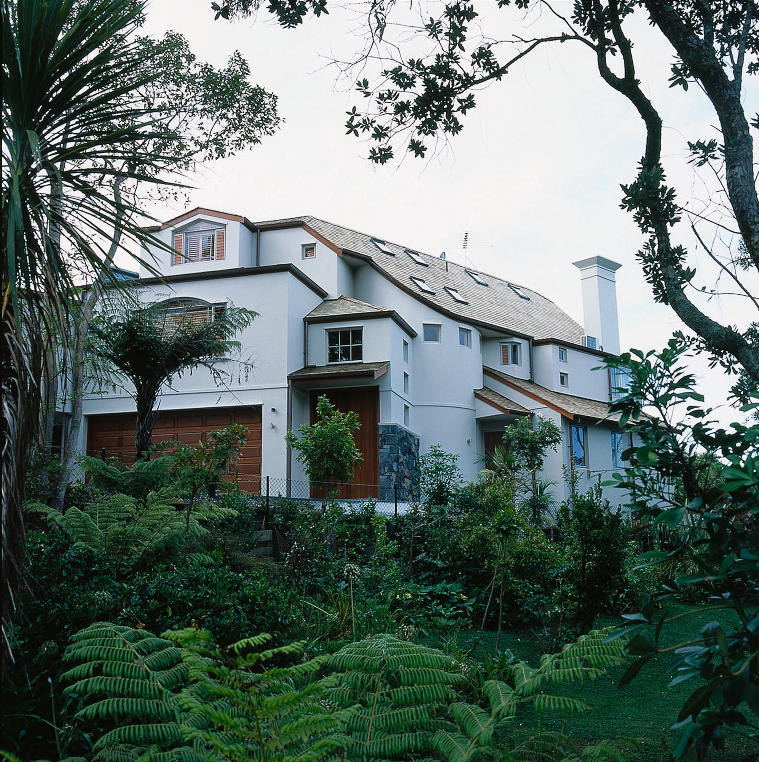 View of this large home - View of architecture, building, cottage, estate, facade, home, house, mansion, neighbourhood, plant, property, real estate, residential area, tree, villa, window, white, green