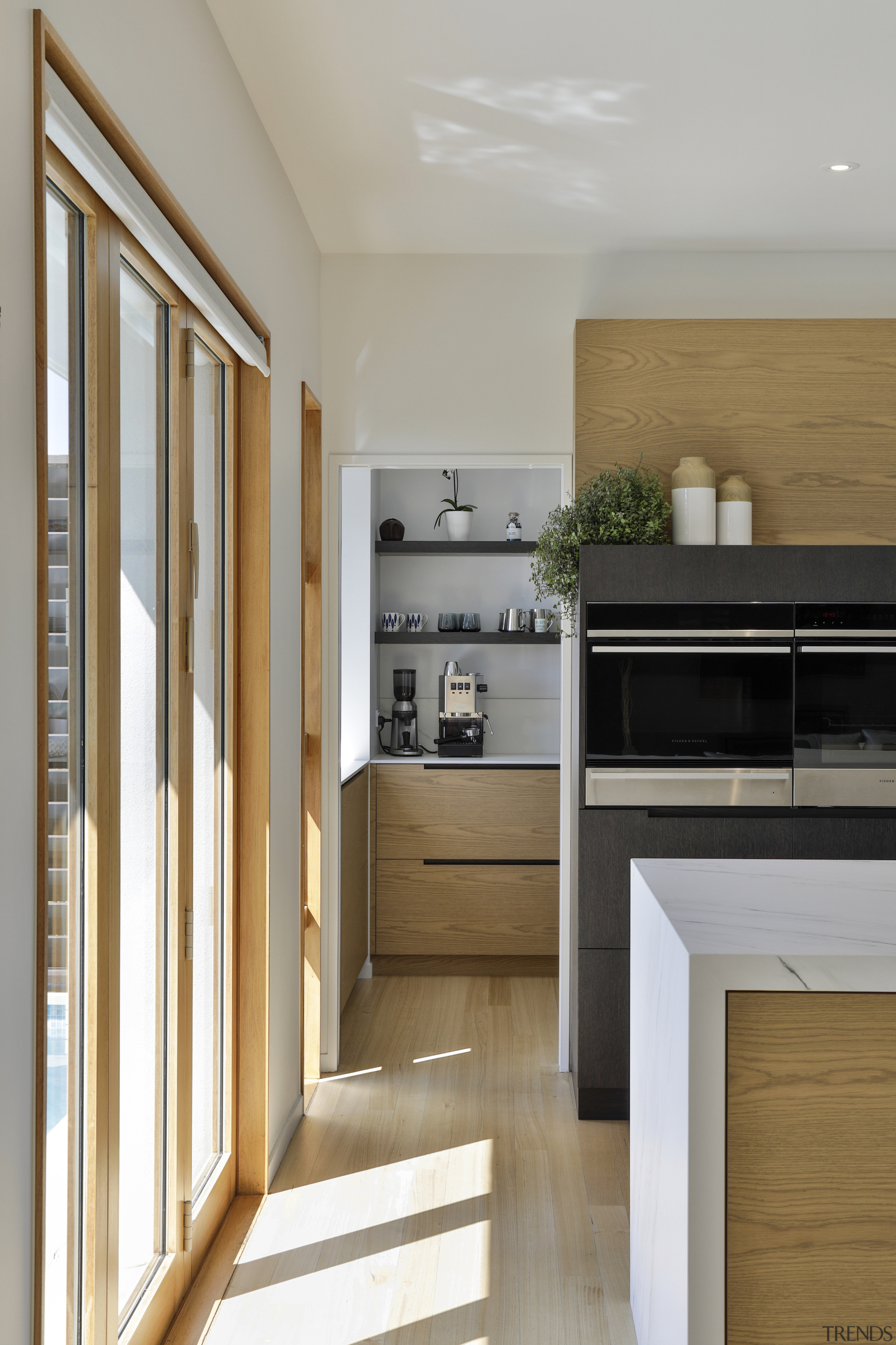 Floor-t-ceiling bifold doors open to the home's spectacular 