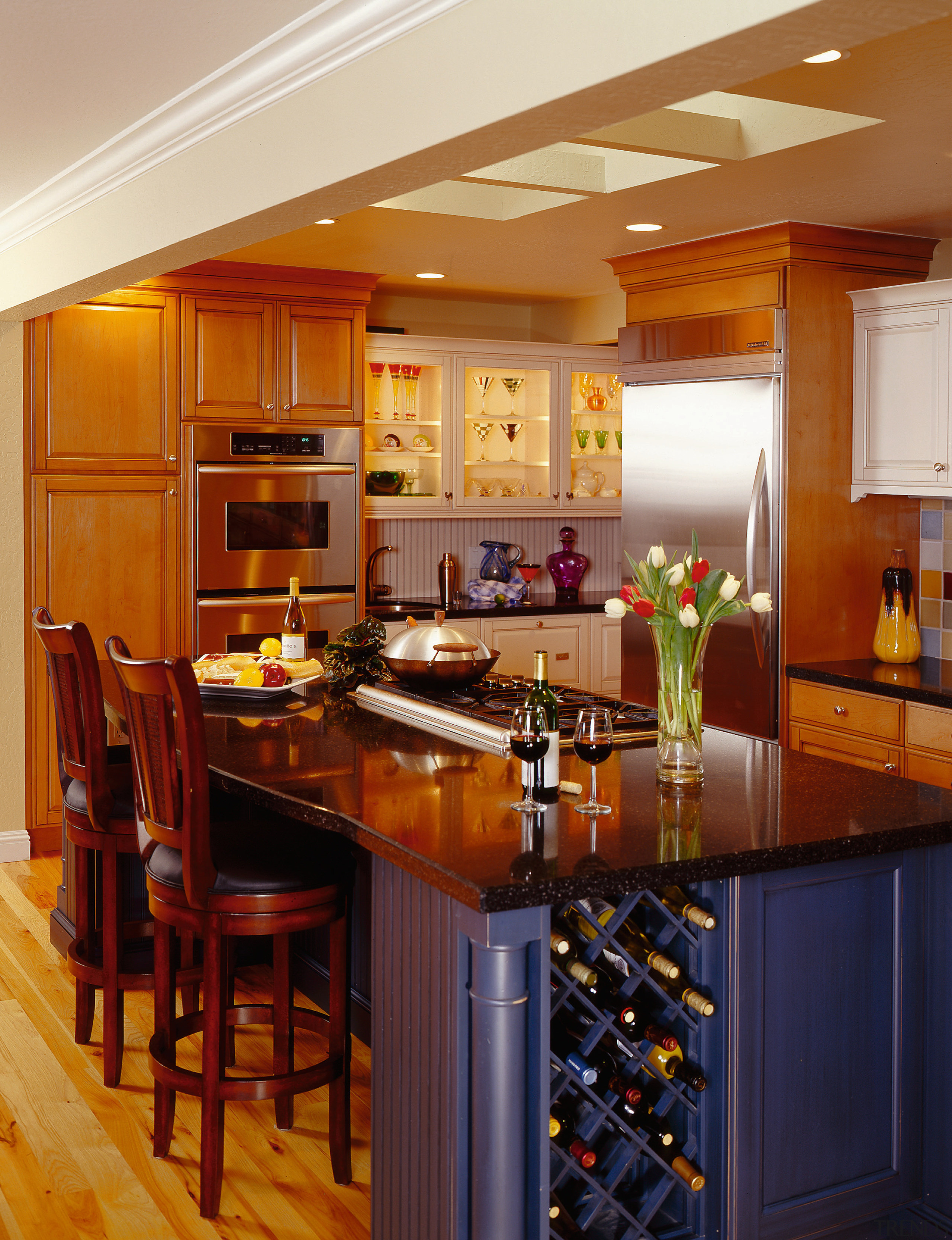 A view of a kitchen by NKBA. - cabinetry, ceiling, countertop, cuisine classique, dining room, hardwood, interior design, kitchen, room, brown
