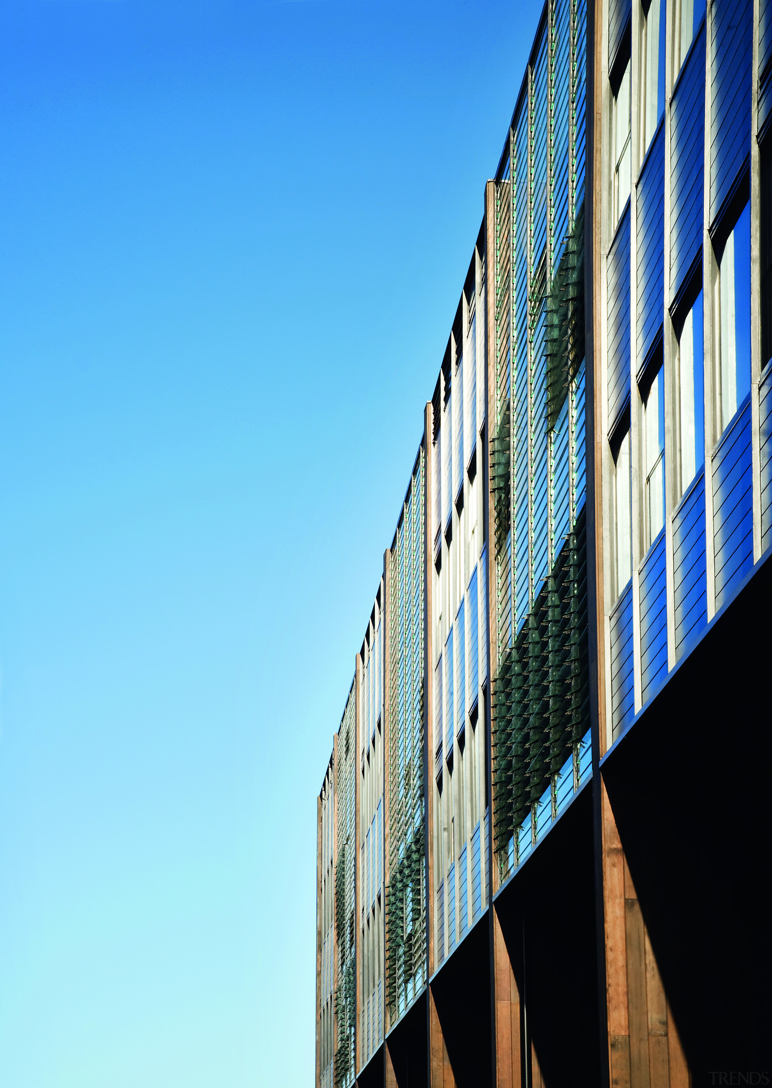 Exterior view of the Hue apartment building which architecture, building, city, condominium, corporate headquarters, daytime, facade, landmark, line, metropolis, metropolitan area, reflection, sky, skyscraper, tower block, urban area, teal