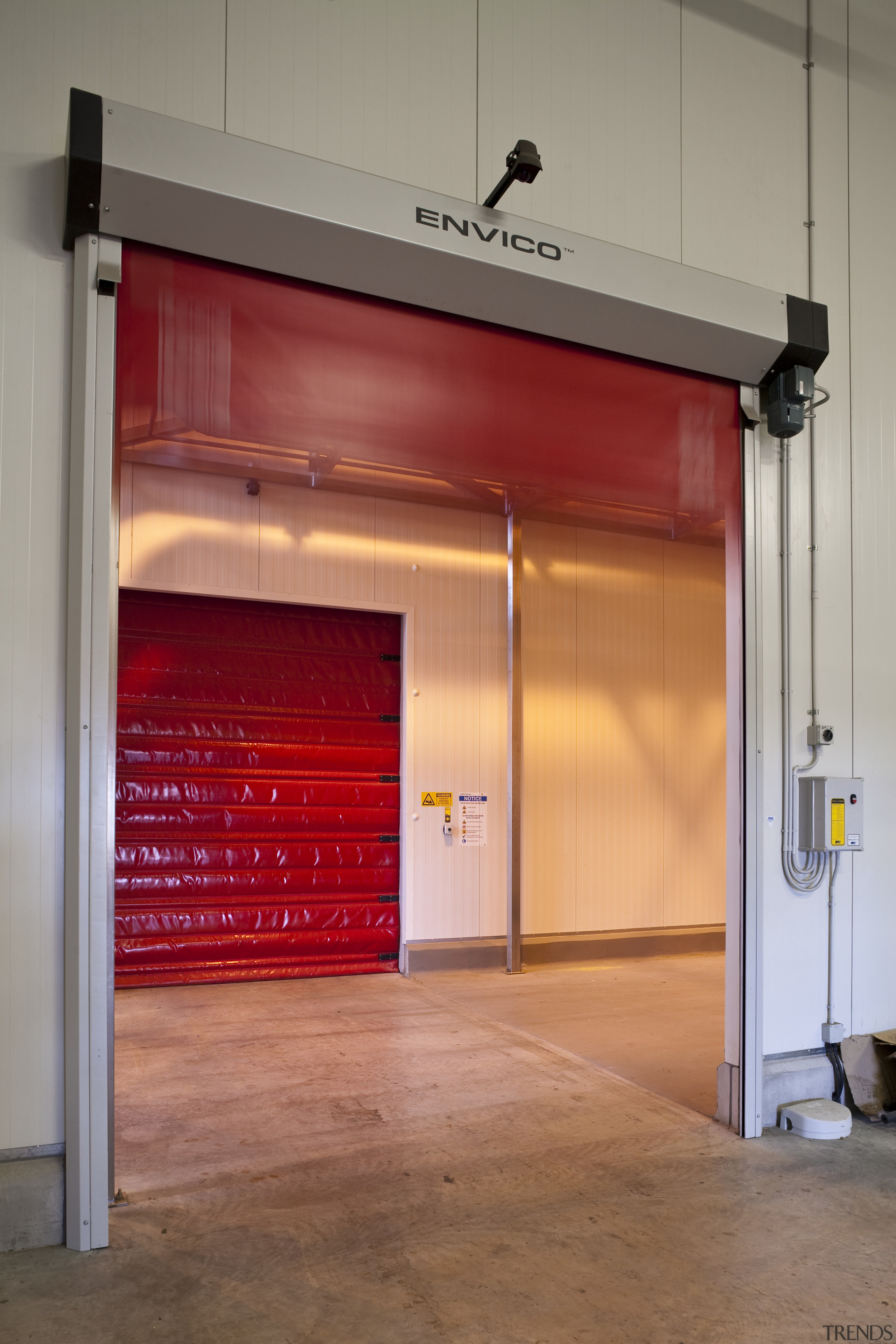 View of the Lion Nathan storage warehouse which door, gray