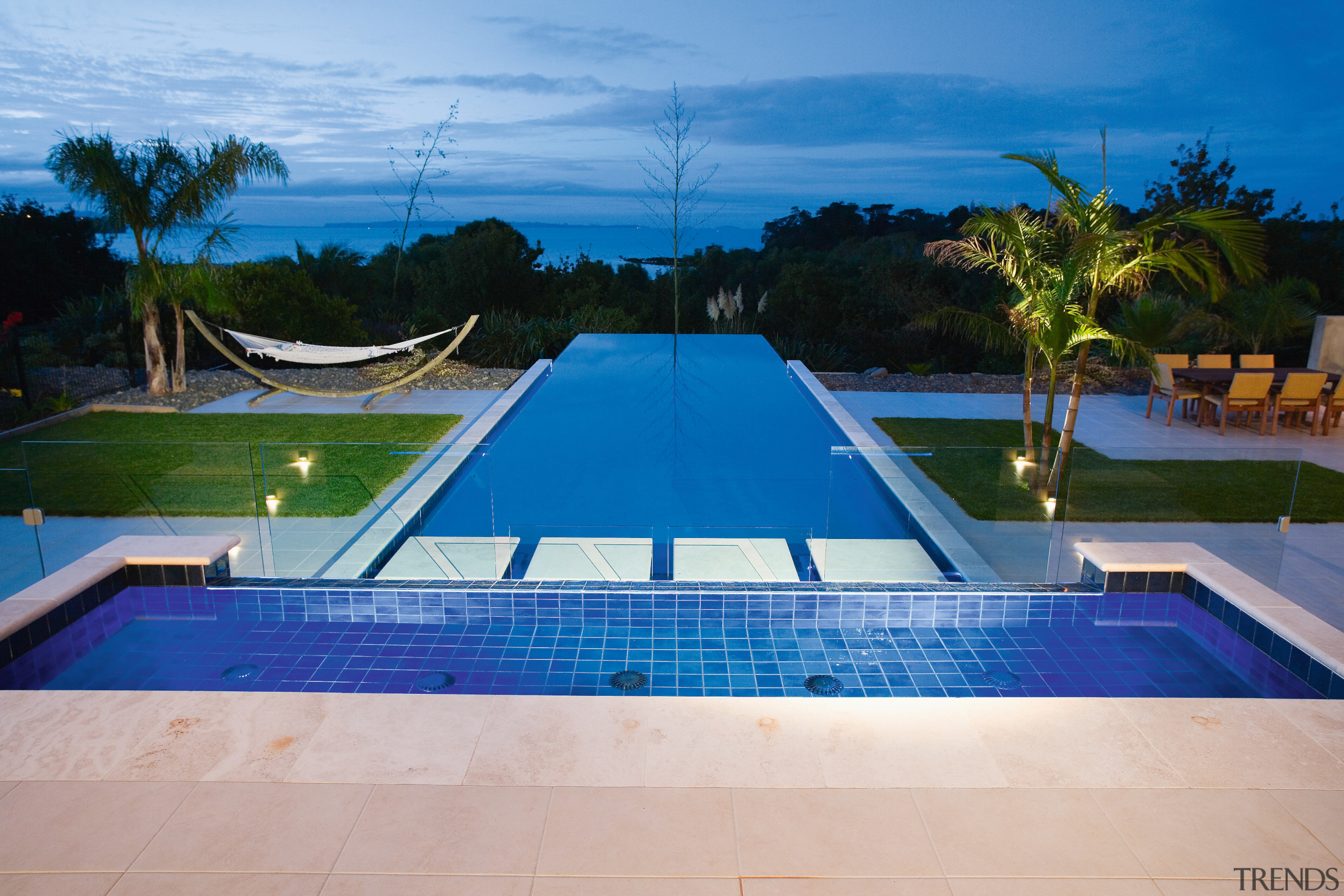 View of this infinity-edge pool built by Frontier estate, leisure, leisure centre, lighting, property, real estate, resort, sky, swimming pool, villa, water, blue