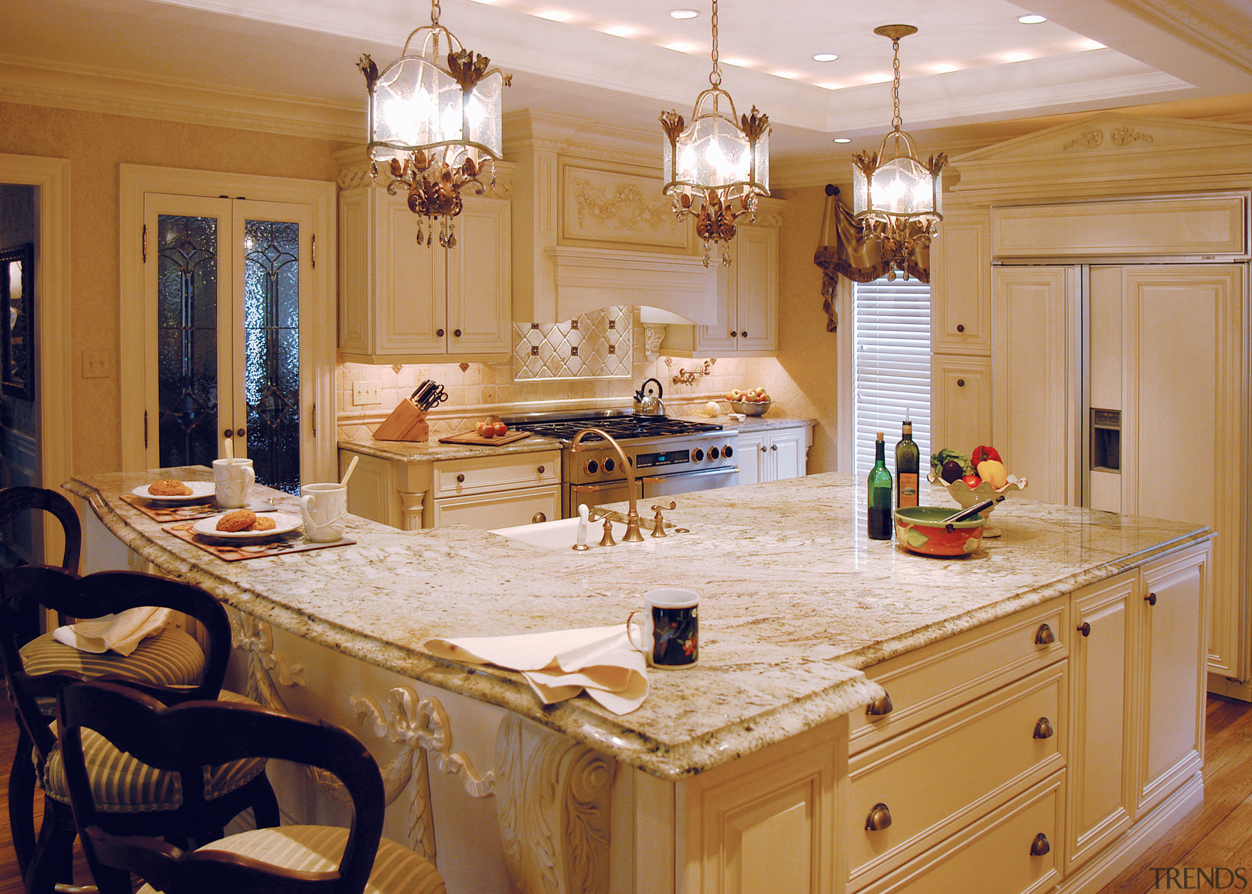 View of this kitchen featuring colonial style tomber cabinetry, countertop, cuisine classique, home, interior design, kitchen, room, orange, brown