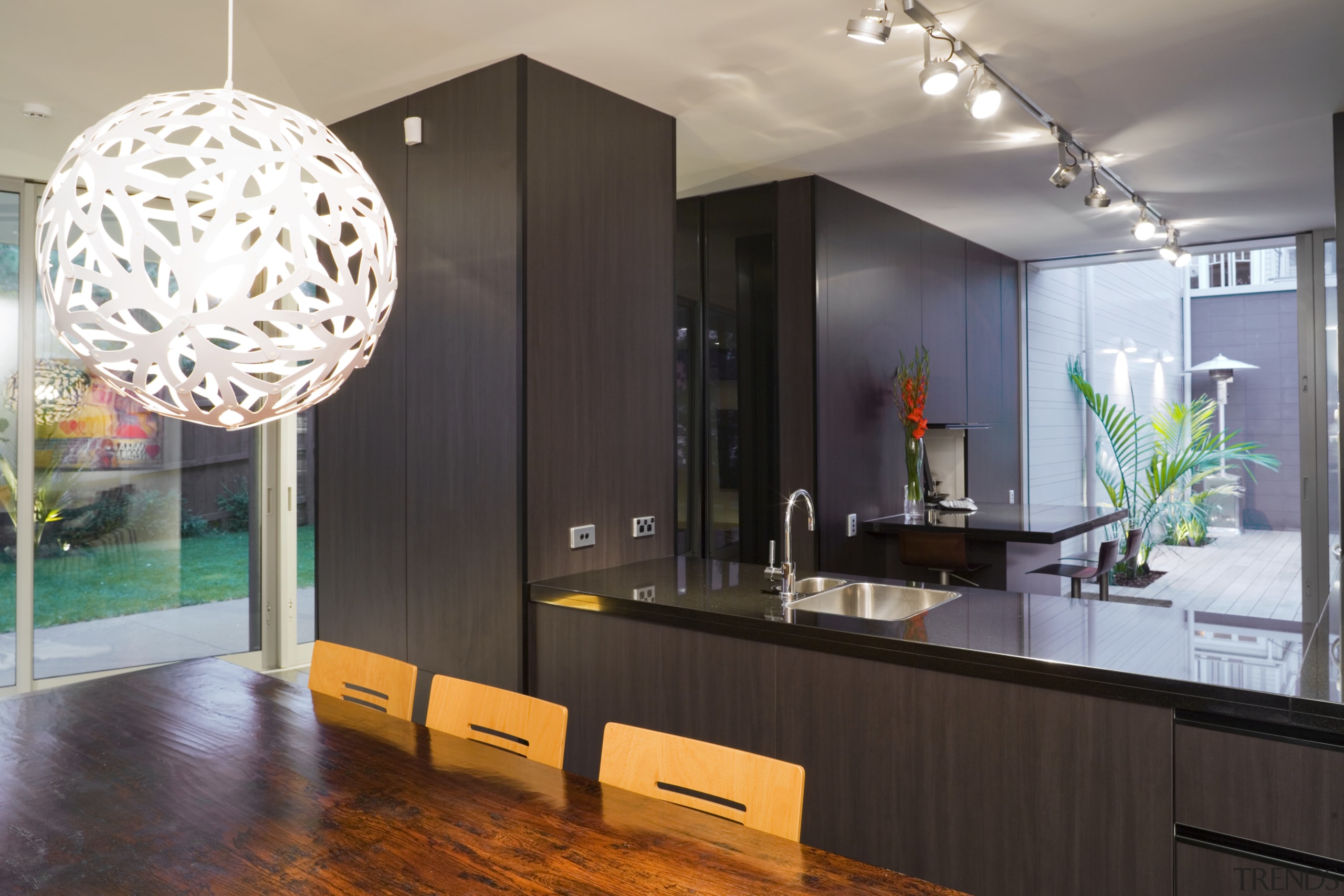 Contemporary kitchen and dining area featuring black glass ceiling, interior design, gray, black