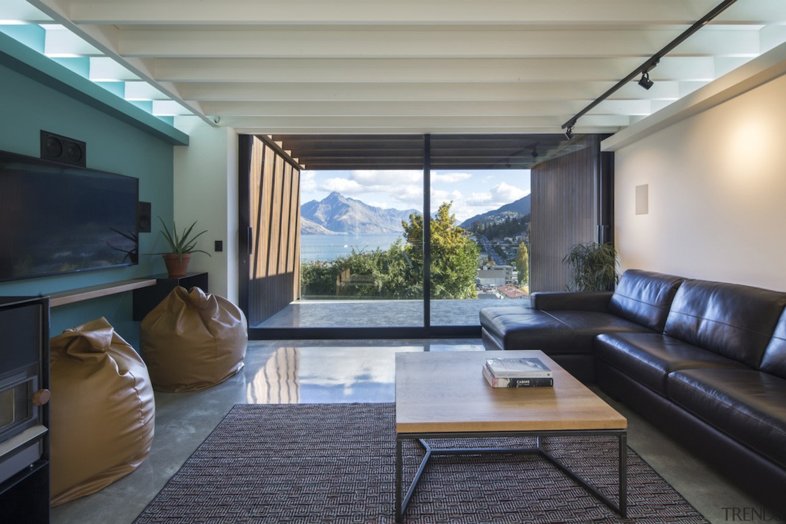Arrowtown-based Bennie Builders was the only Southern Lakes ceiling, daylighting, house, interior design, living room, real estate, room, window, gray, black