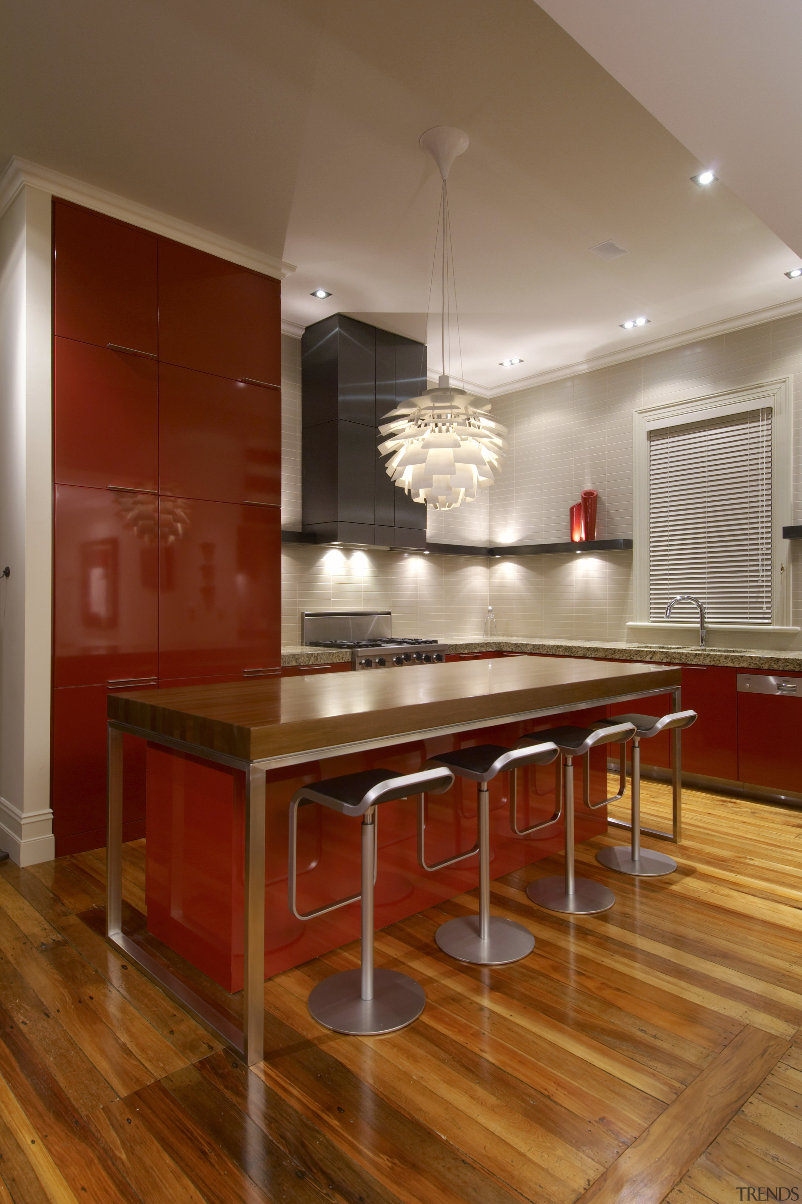 View of a modern kitchen which features a cabinetry, ceiling, countertop, dining room, floor, flooring, furniture, hardwood, interior design, kitchen, laminate flooring, room, table, wood, wood flooring, brown