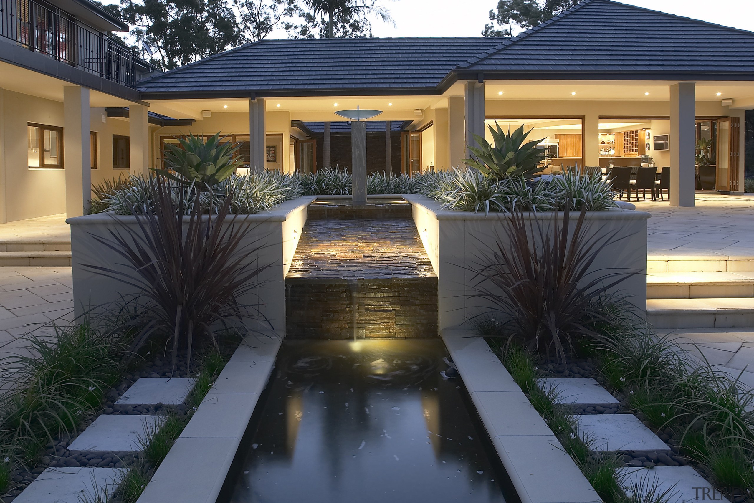 Exterior view of a home which was designed architecture, backyard, courtyard, estate, facade, home, house, landscape lighting, landscaping, lighting, property, real estate, residential area, siding, window, yard, black