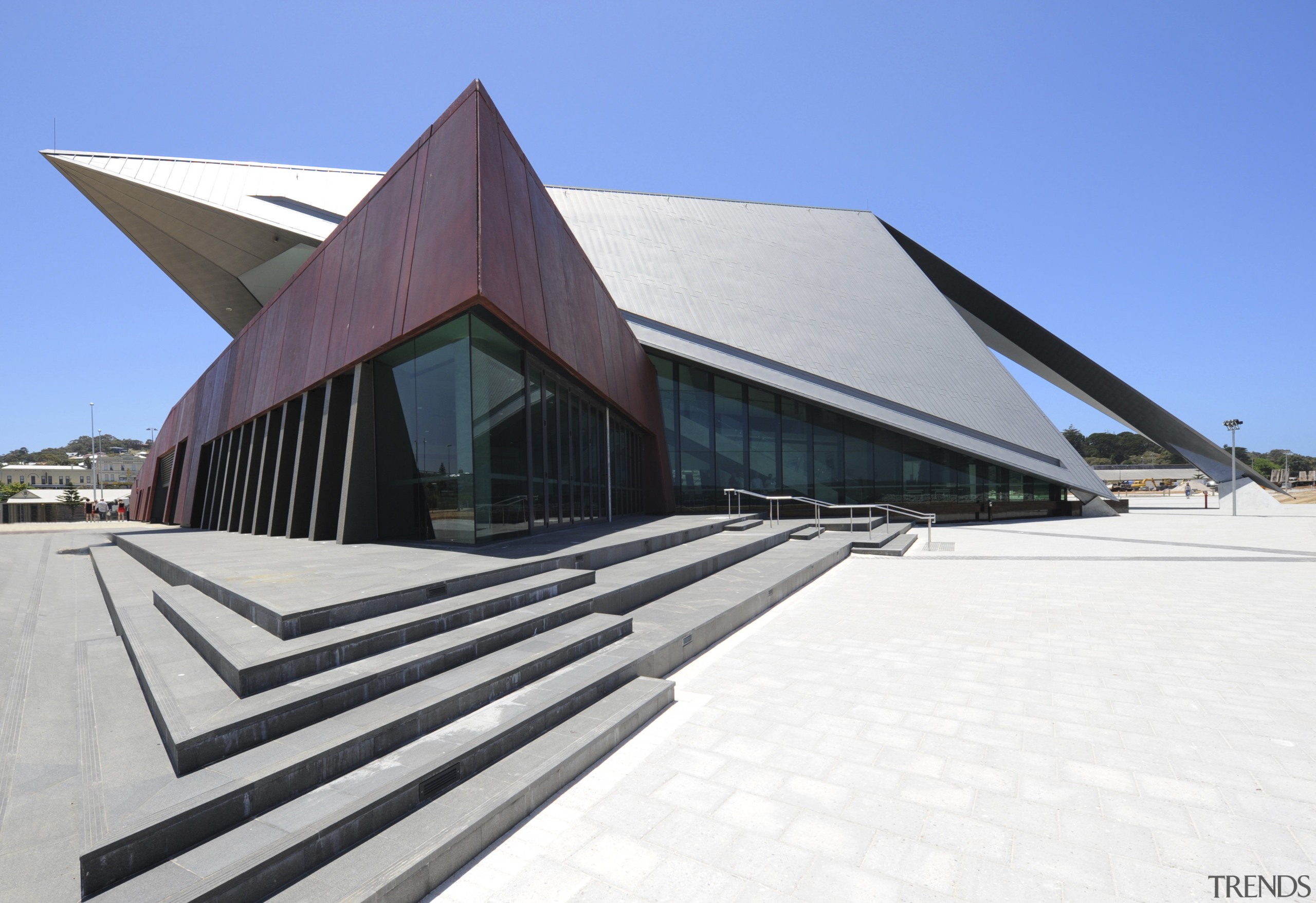 View of the exterior of the Albany Entertainment architecture, building, daylighting, facade, house, roof, sky, structure, white, teal