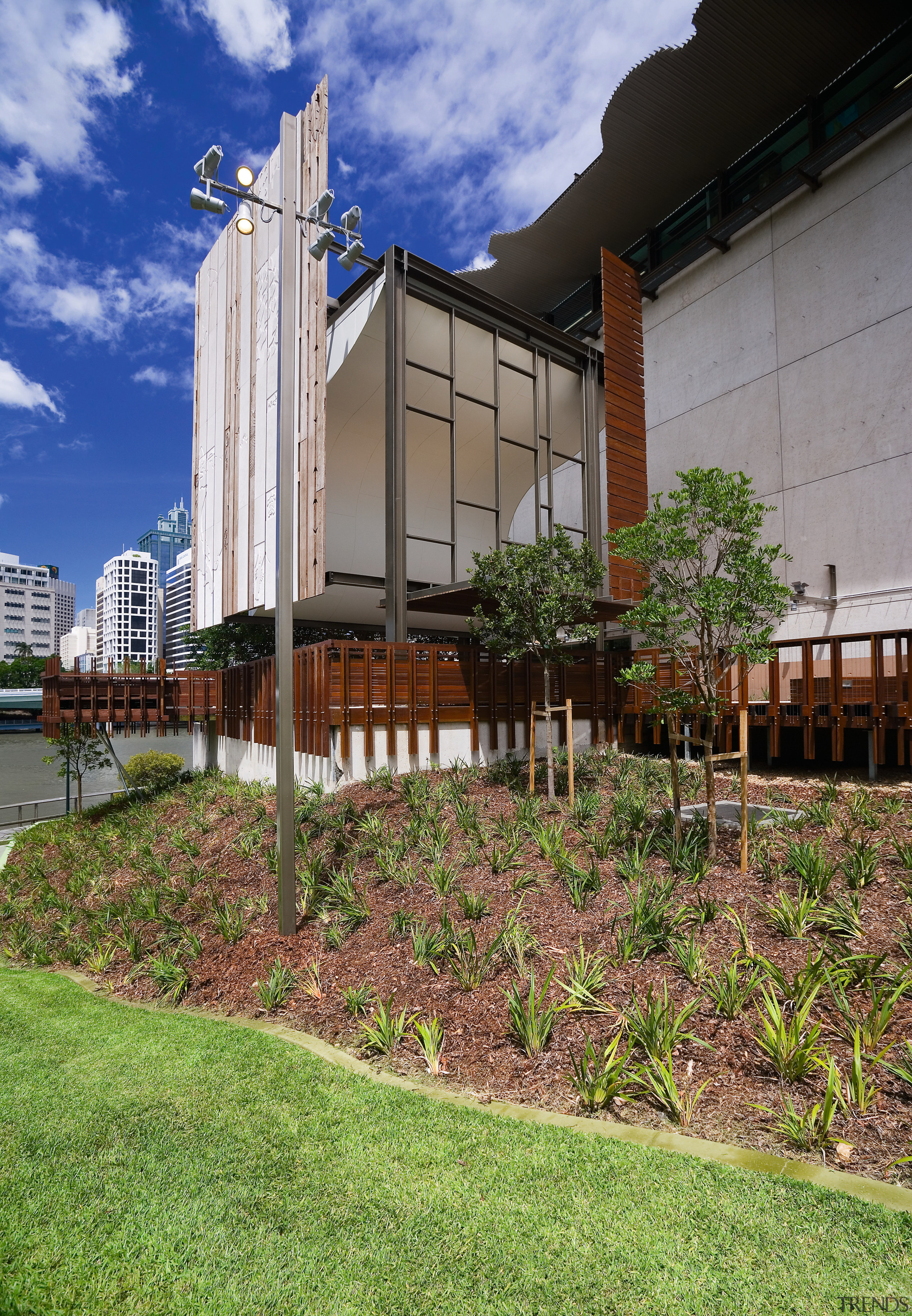 A view of some landscaping by Dig It architecture, facade, grass, home, house, outdoor structure, real estate, residential area, sky, gray