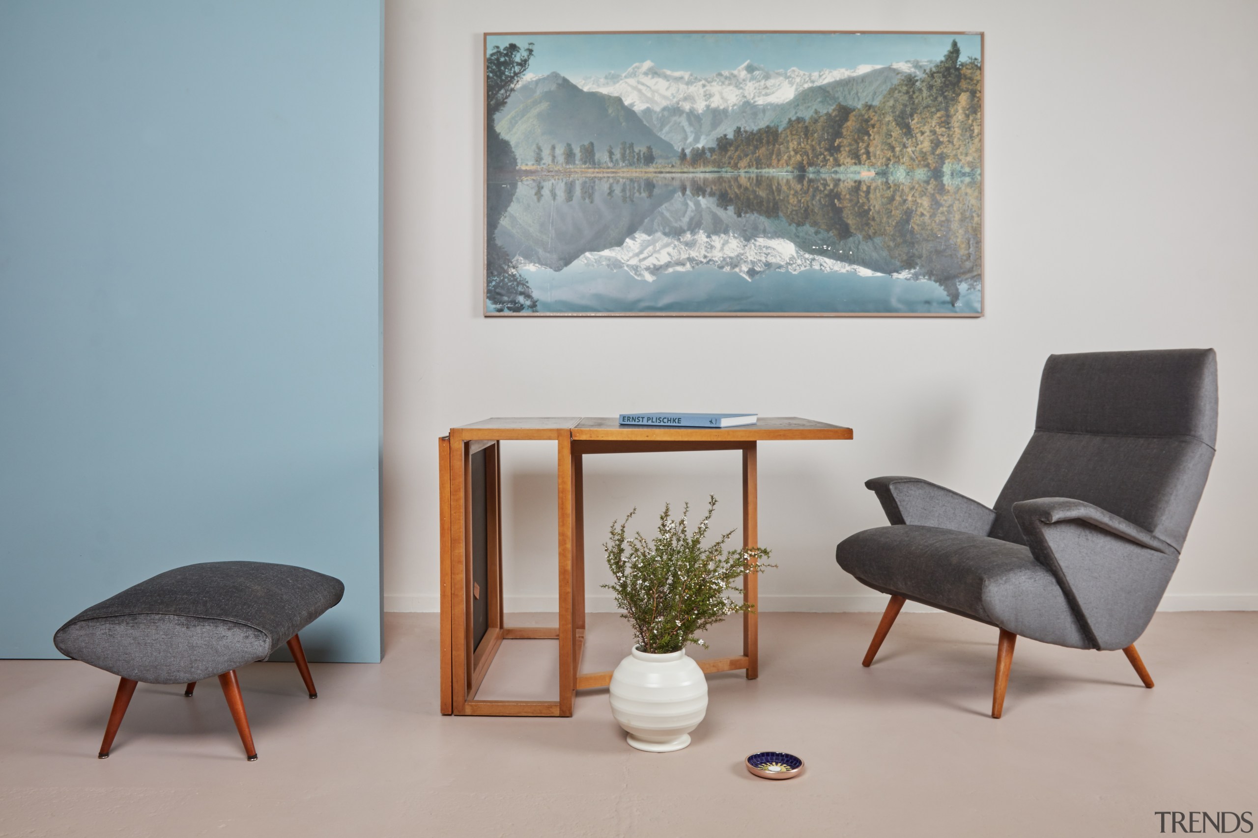 Select a few key pieces and layer an chair, furniture, interior design, table, gray