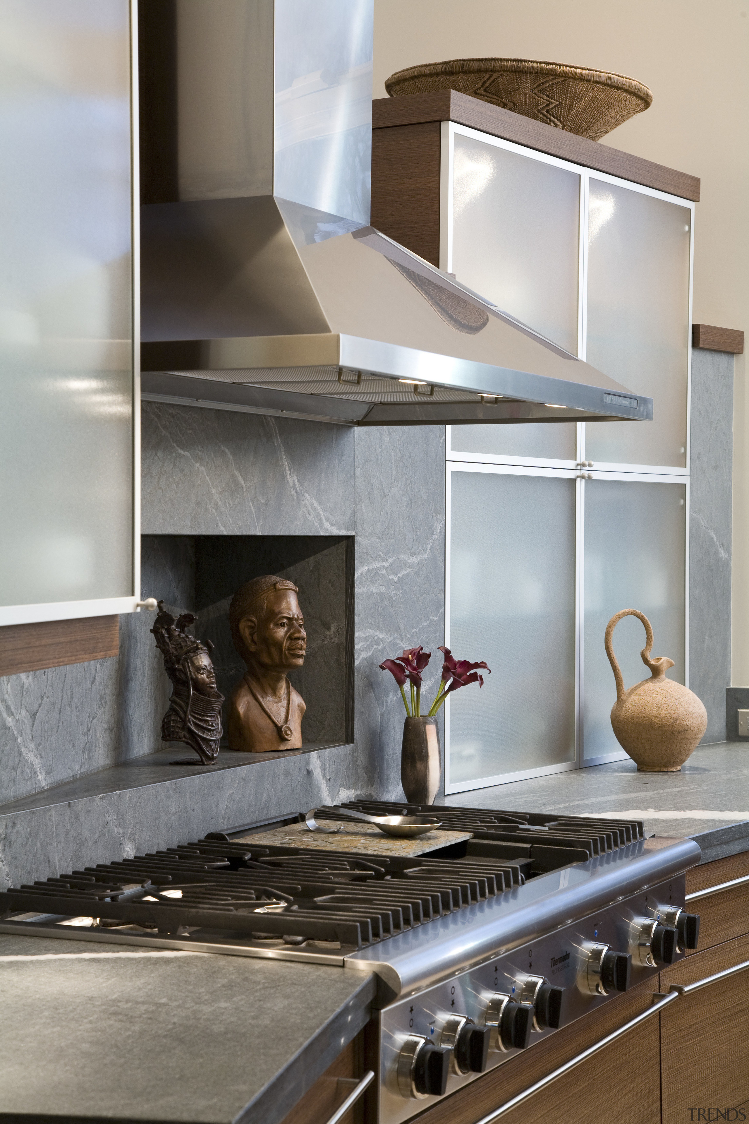 View of kitchen featuring a stainless steel range countertop, hearth, interior design, kitchen, room, gray