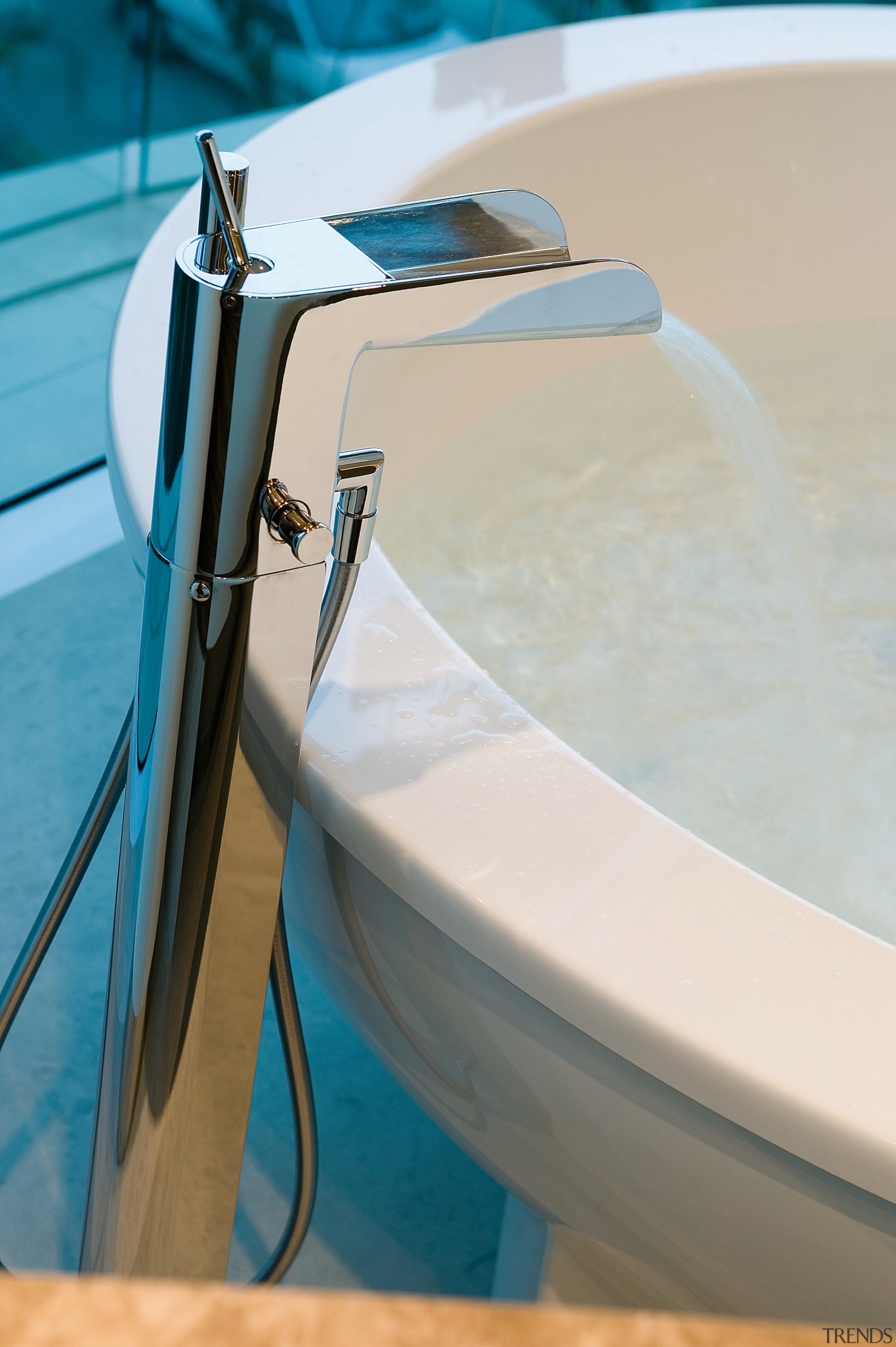 The clean lines of the freestanding spa bath bathtub, plumbing fixture, product design, tap, water, gray