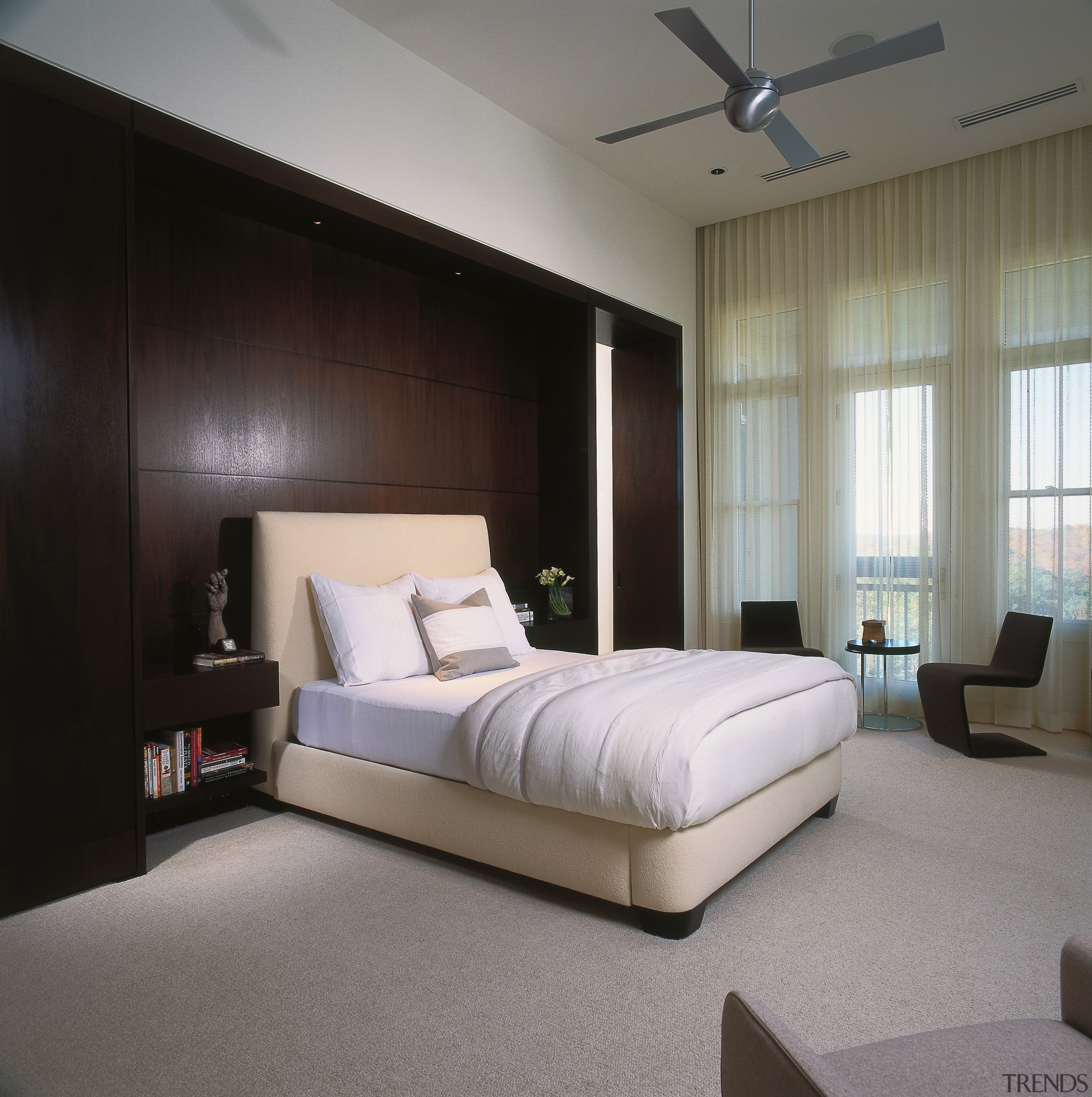 A view of the master bedroom, carpet, wooden bed, bed frame, bedroom, ceiling, floor, furniture, interior design, mattress, room, wall, window, window covering, gray, black