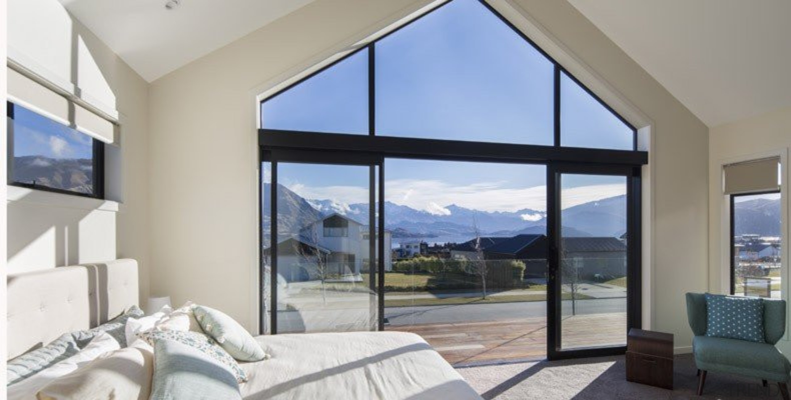 Master suite in this house is positioned for architecture, daylighting, door, estate, home, house, interior design, living room, penthouse apartment, property, real estate, window, gray