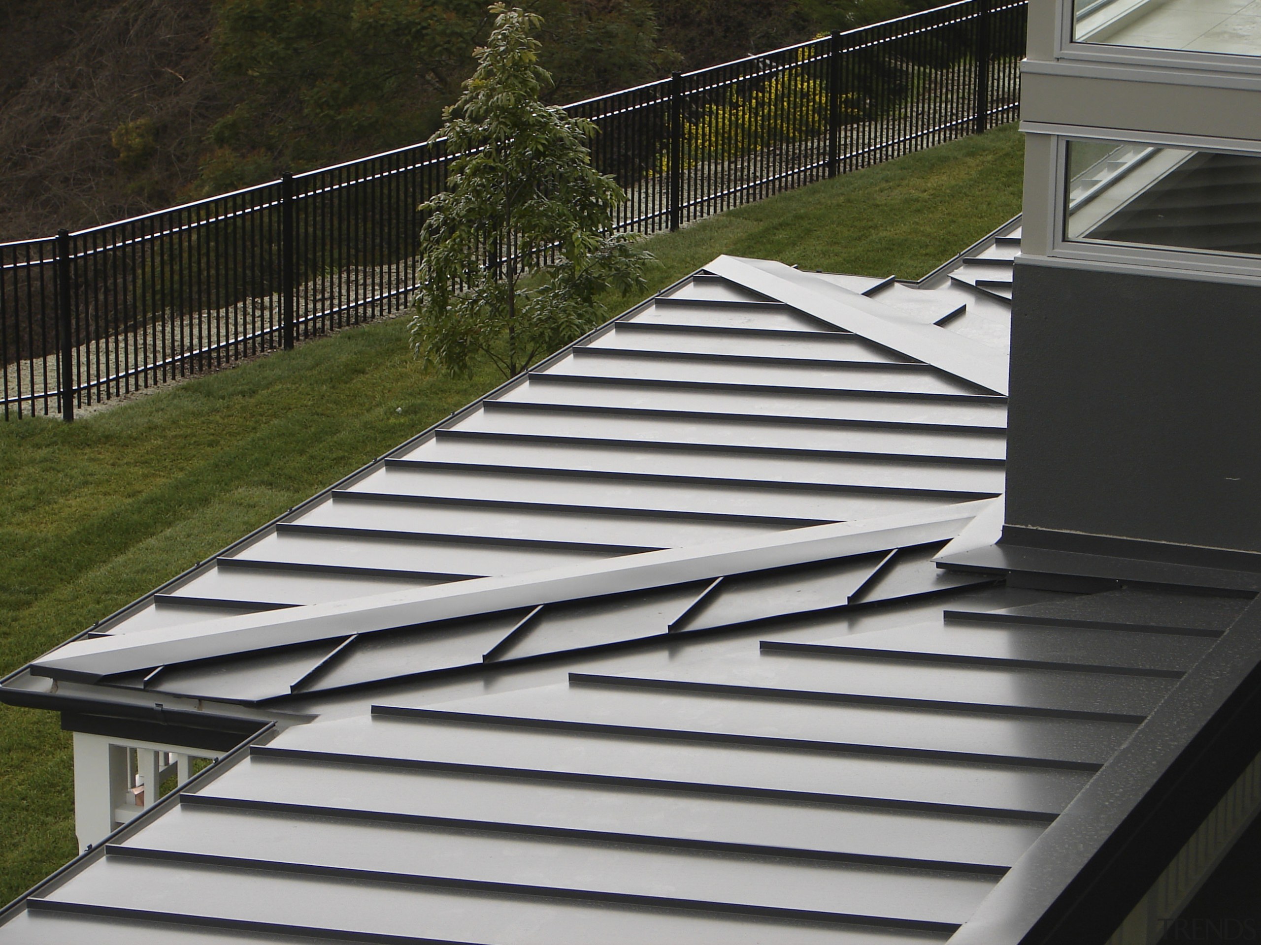 View of the roofing by Roofing Industries - architecture, daylighting, deck, handrail, house, line, outdoor structure, roof, stairs, gray, black, brown