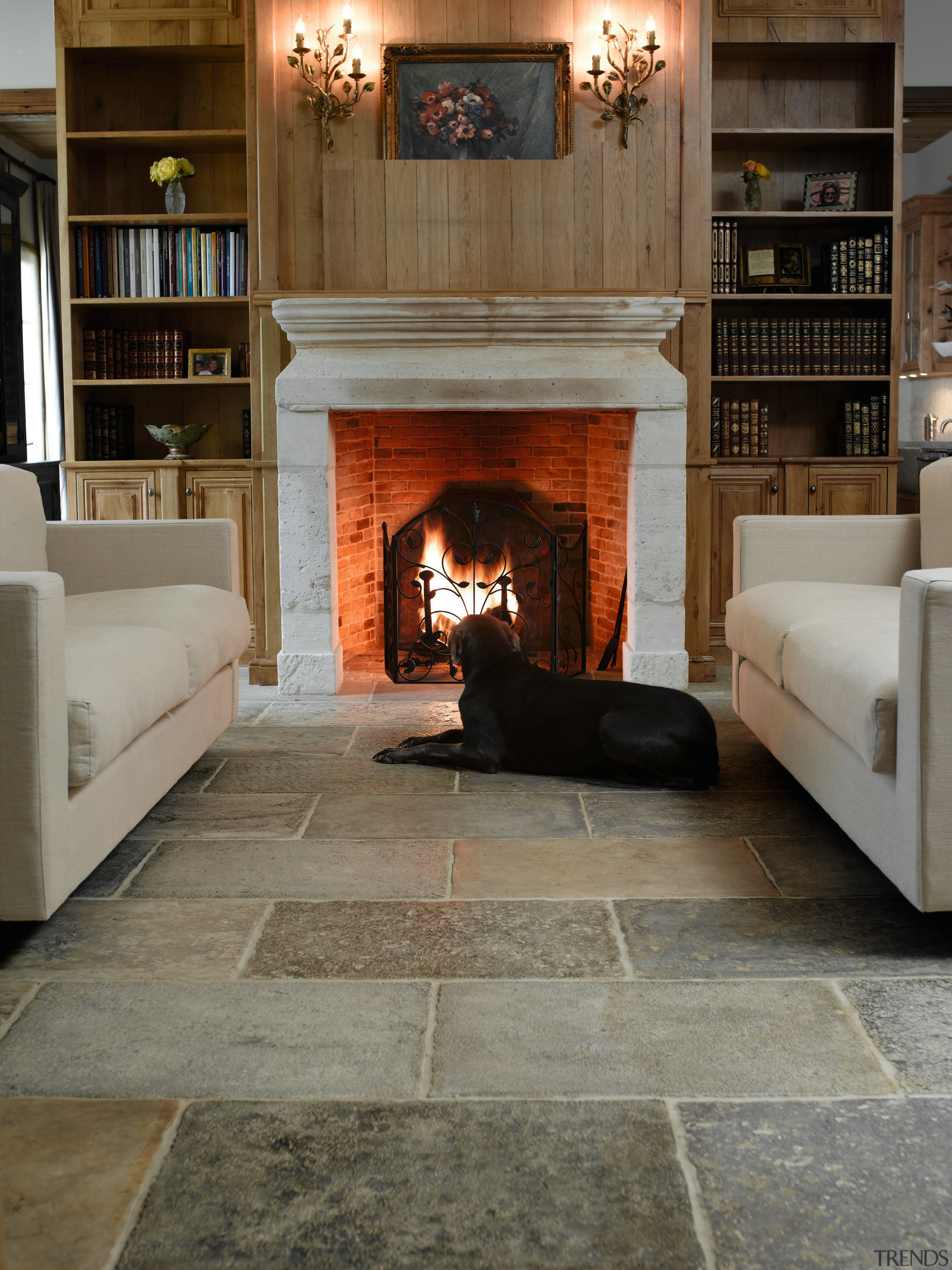 A view of the Aged limestone Dalle de fireplace, floor, flooring, hardwood, hearth, home, interior design, laminate flooring, living room, tile, wood, wood burning stove, wood flooring, gray, brown