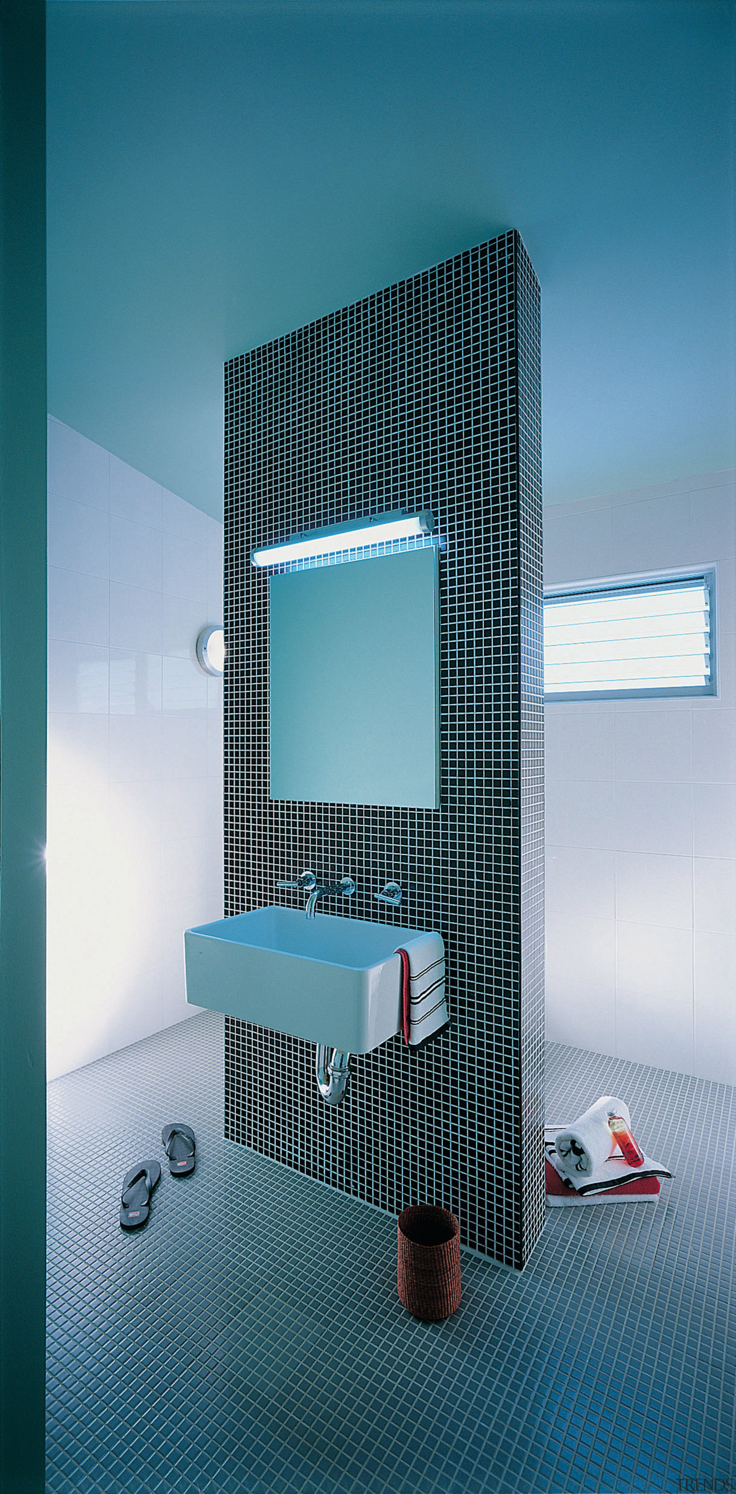 Bathroom with tiled wall in middle of room architecture, glass, product, product design, teal