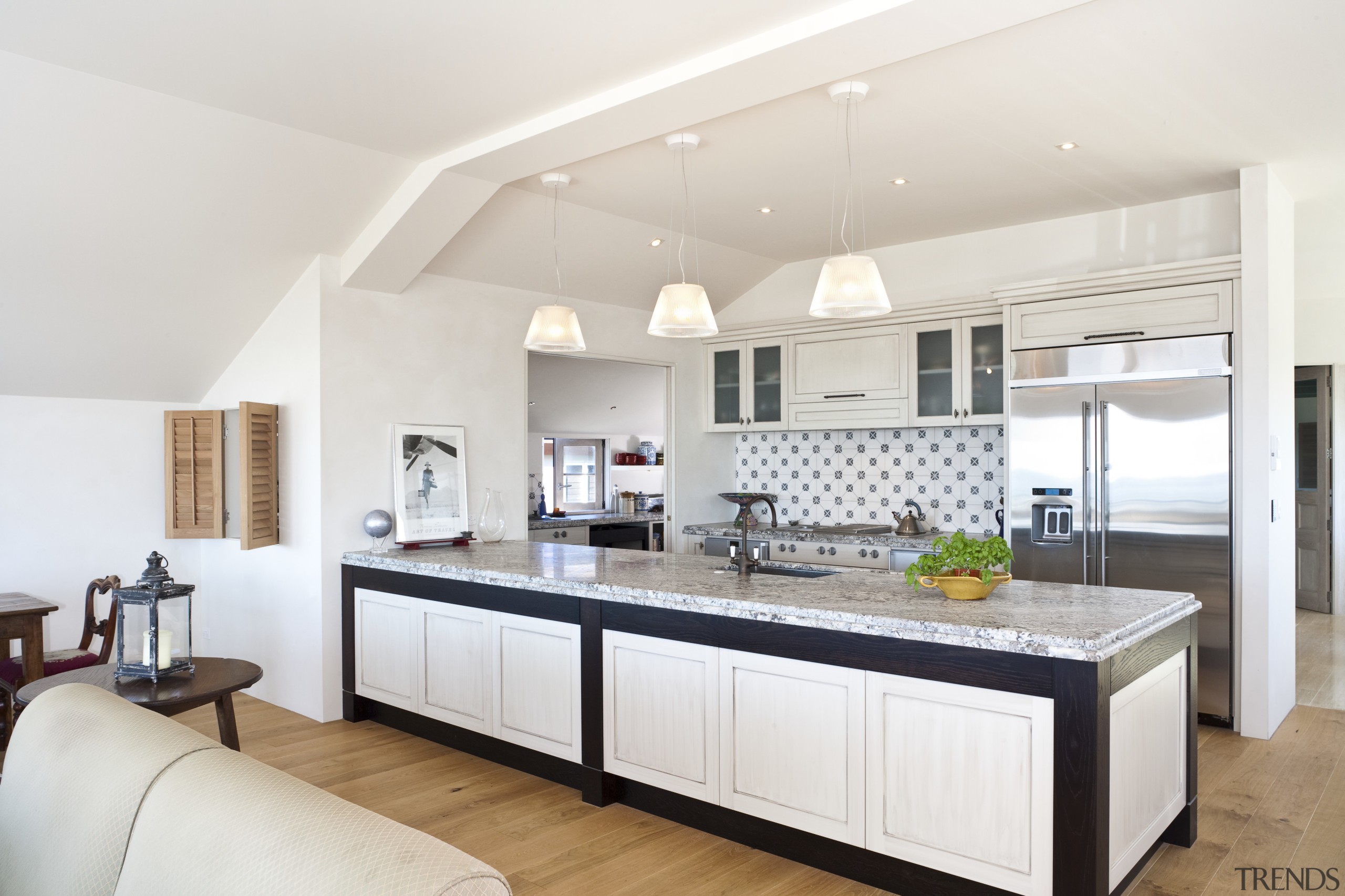 Traditional kitchen features stainless steel appliances &amp; wooden countertop, cuisine classique, interior design, kitchen, real estate, room, white