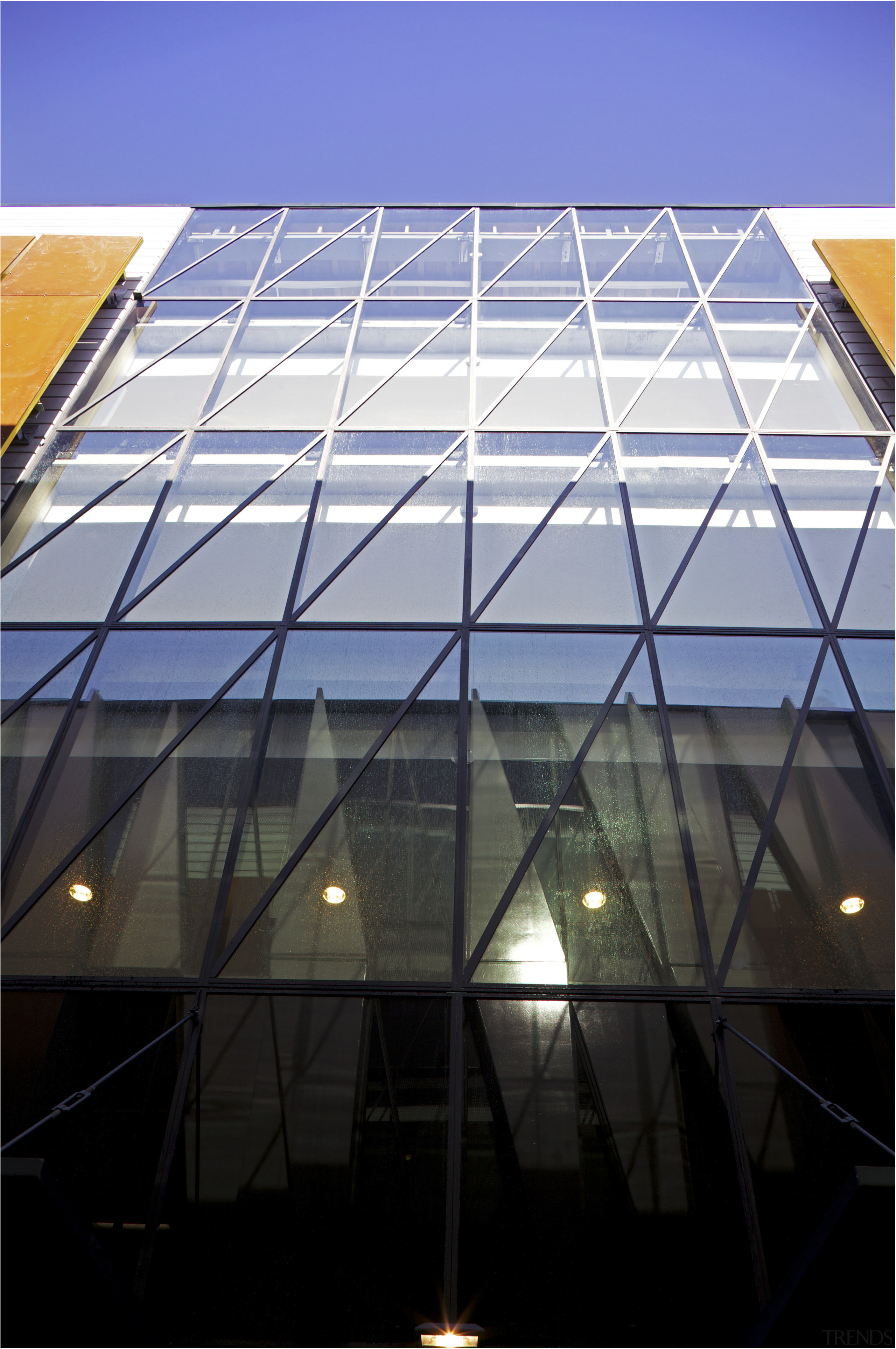 Merchant Quarter boasts a dramatic facade  conceived architecture, building, corporate headquarters, daylighting, daytime, facade, glass, line, metropolitan area, reflection, roof, sky, structure, sunlight, window, black