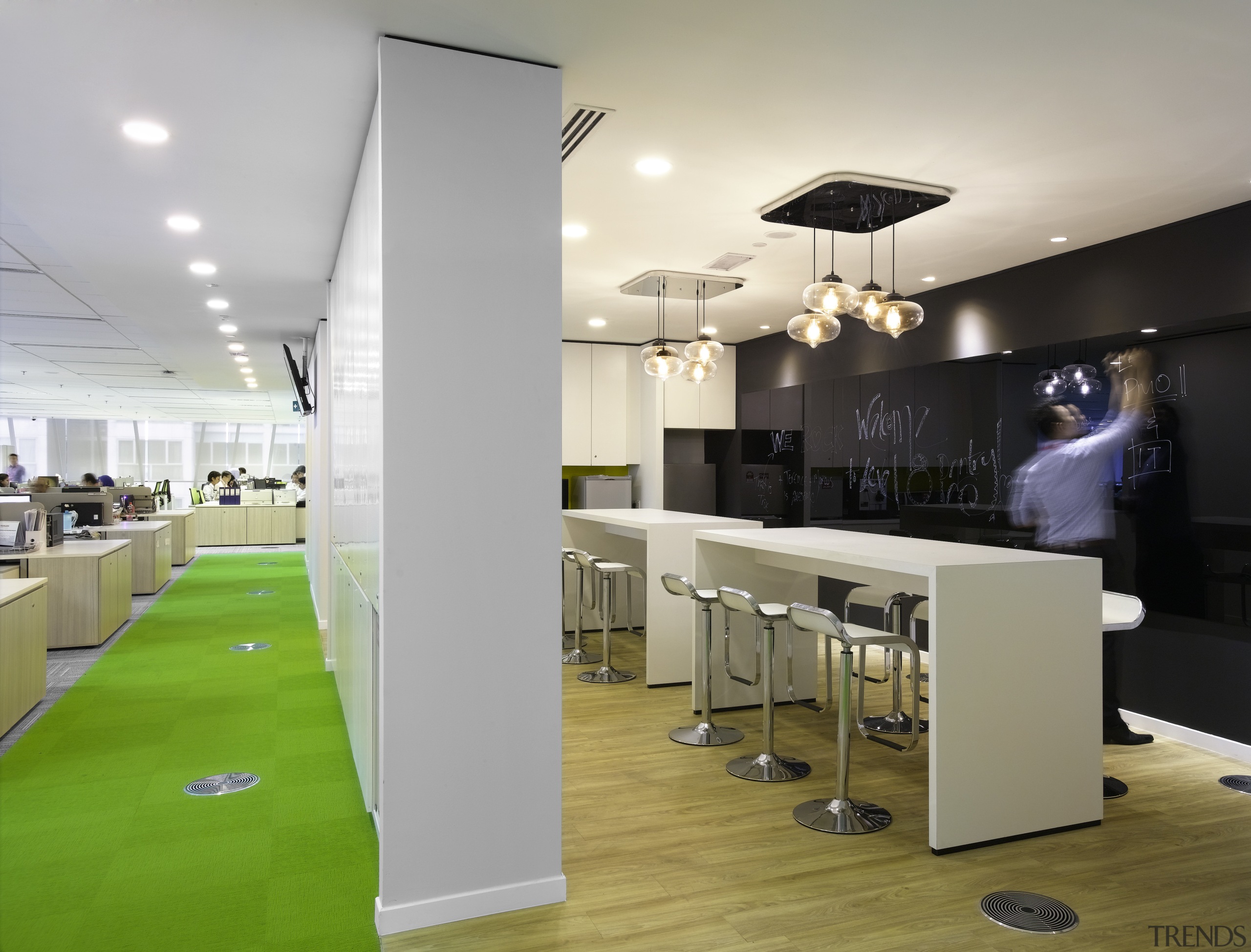 While the café on the communal floor of ceiling, interior design, office, gray