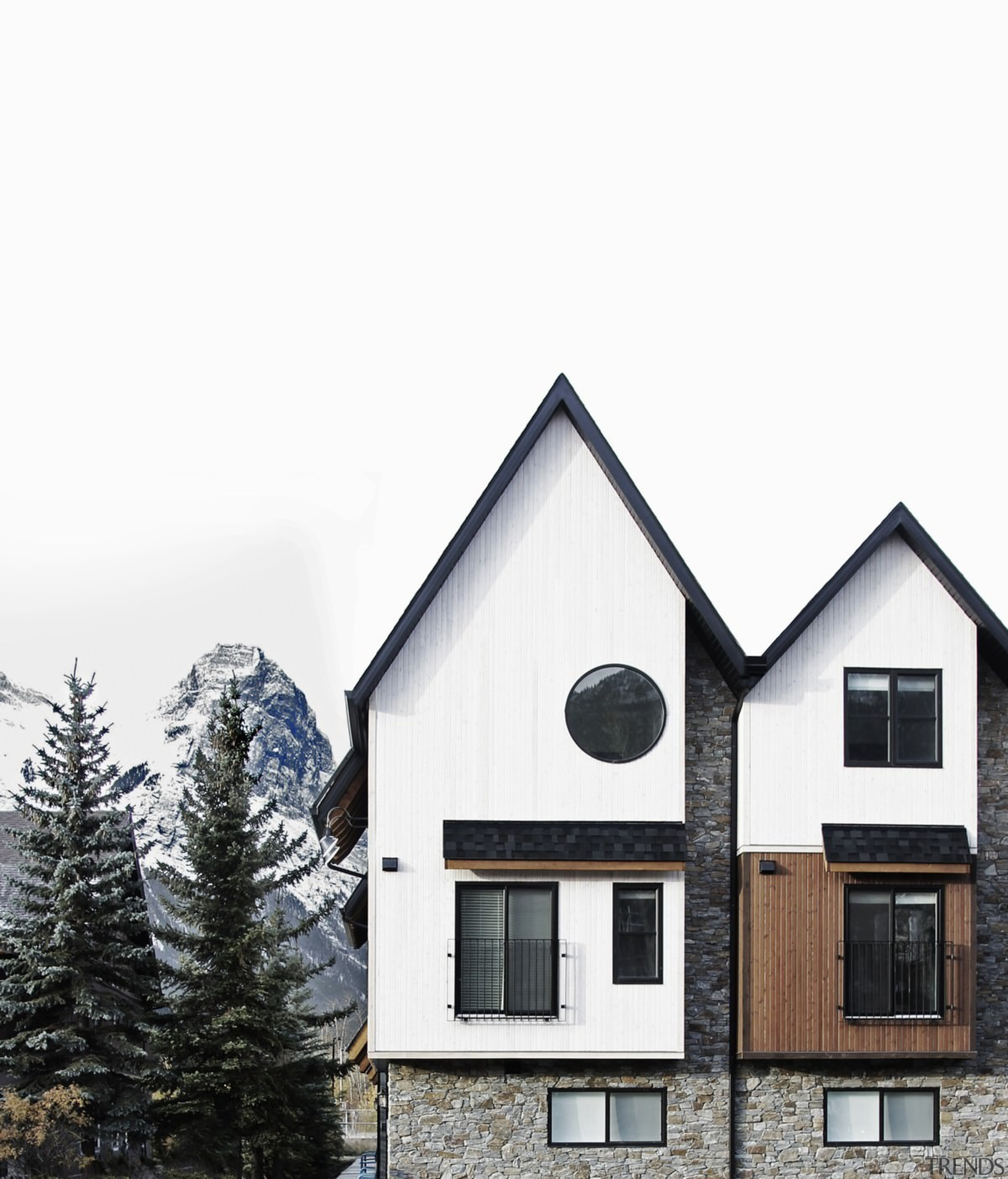 Tall and narrow, the lodge is a perfect architecture, building, cottage, elevation, facade, home, house, property, real estate, roof, siding, sky, window, white