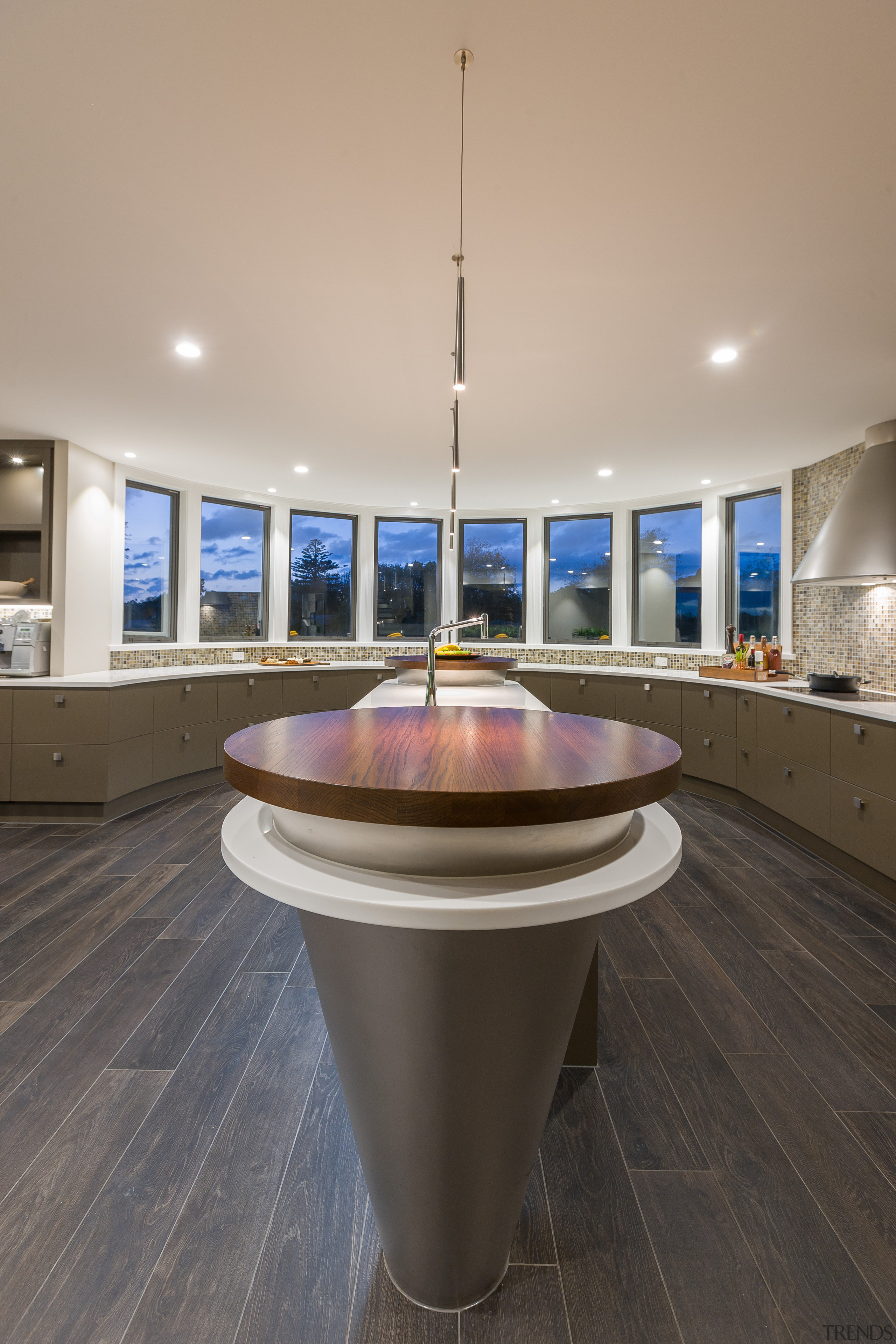 Stained oak chopping boards sit on the top floor, flooring, interior design, table, gray