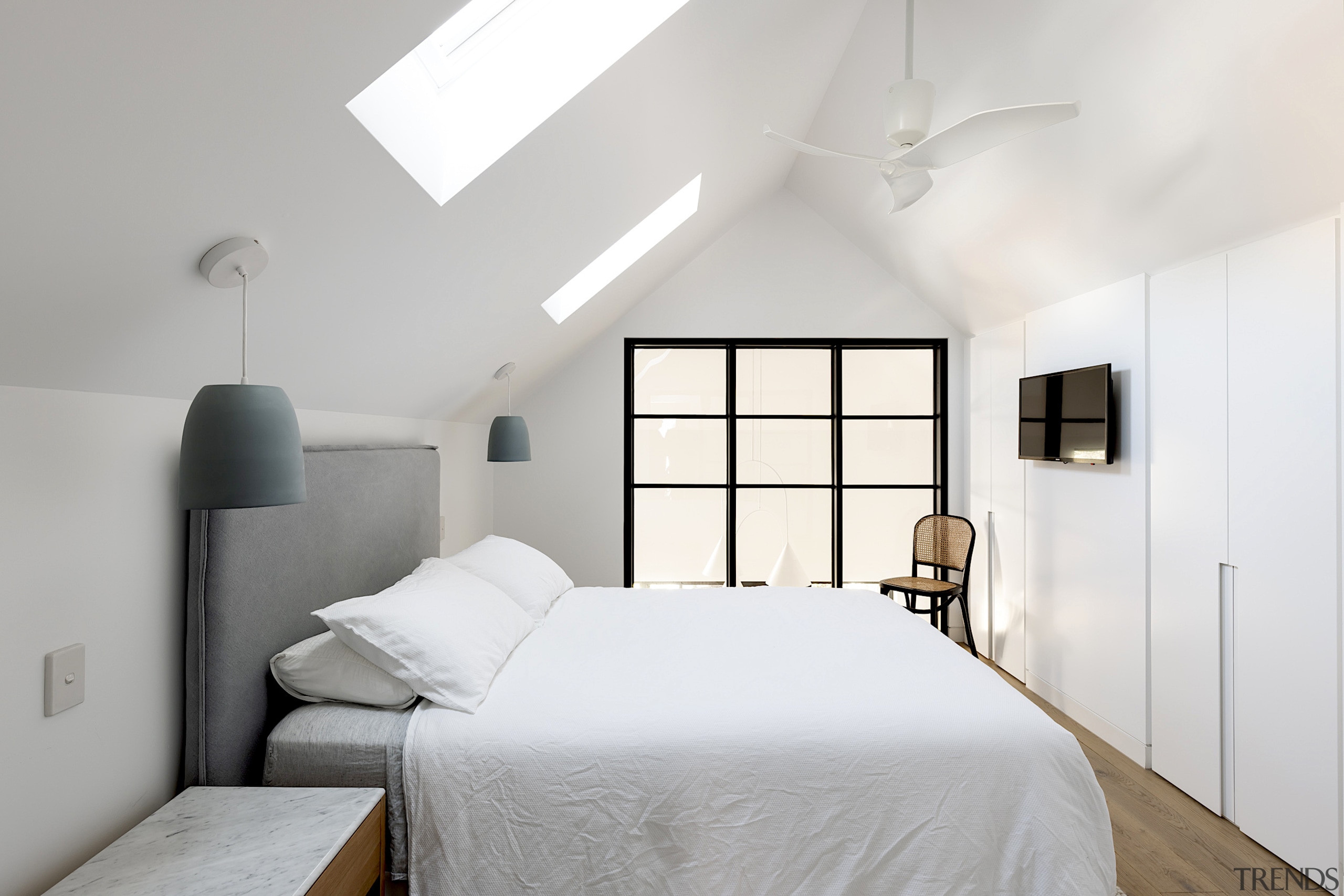 An airy new bedroom complete with skylights. 