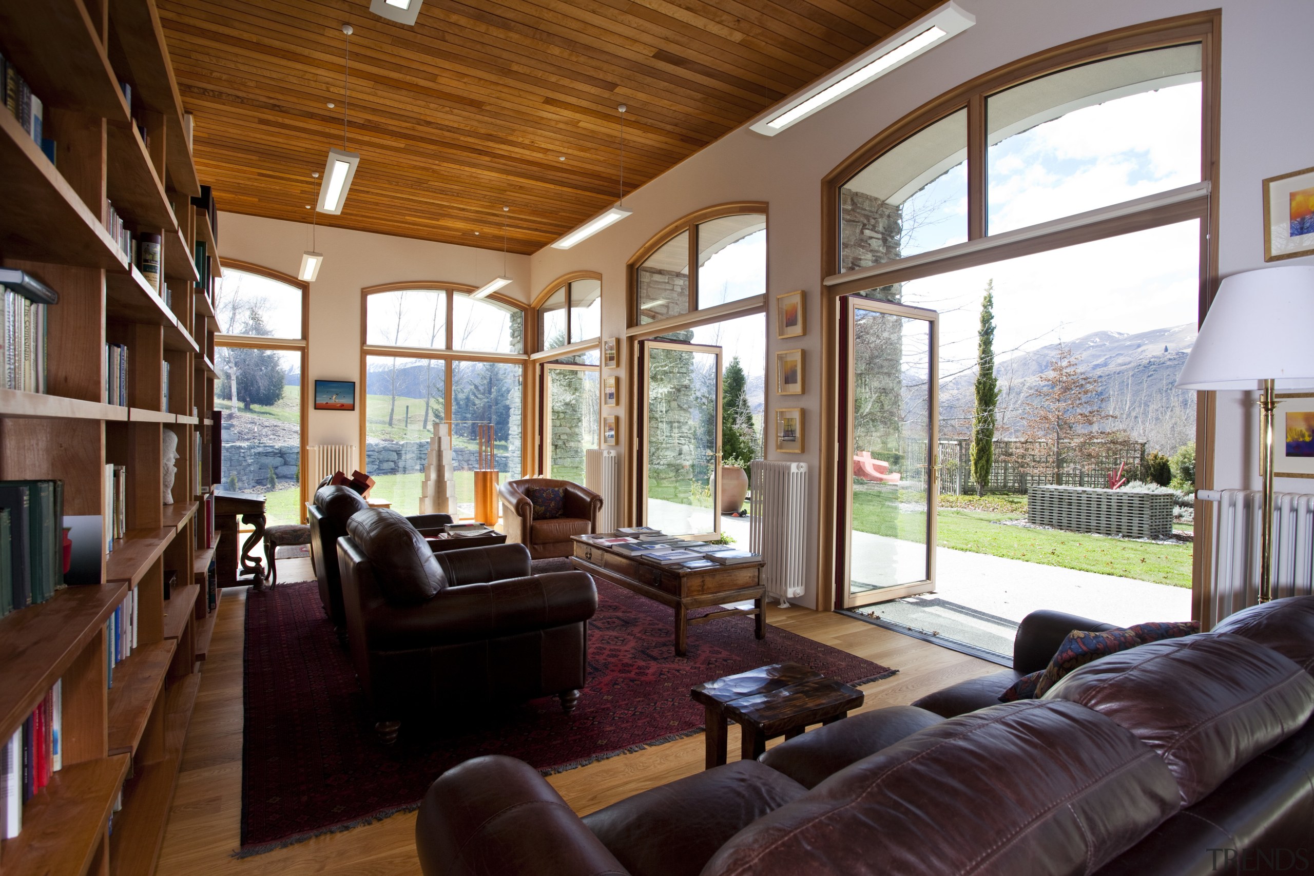 This home in Queenstown was renovated by architect estate, home, house, interior design, living room, property, real estate, room, window, wood, red