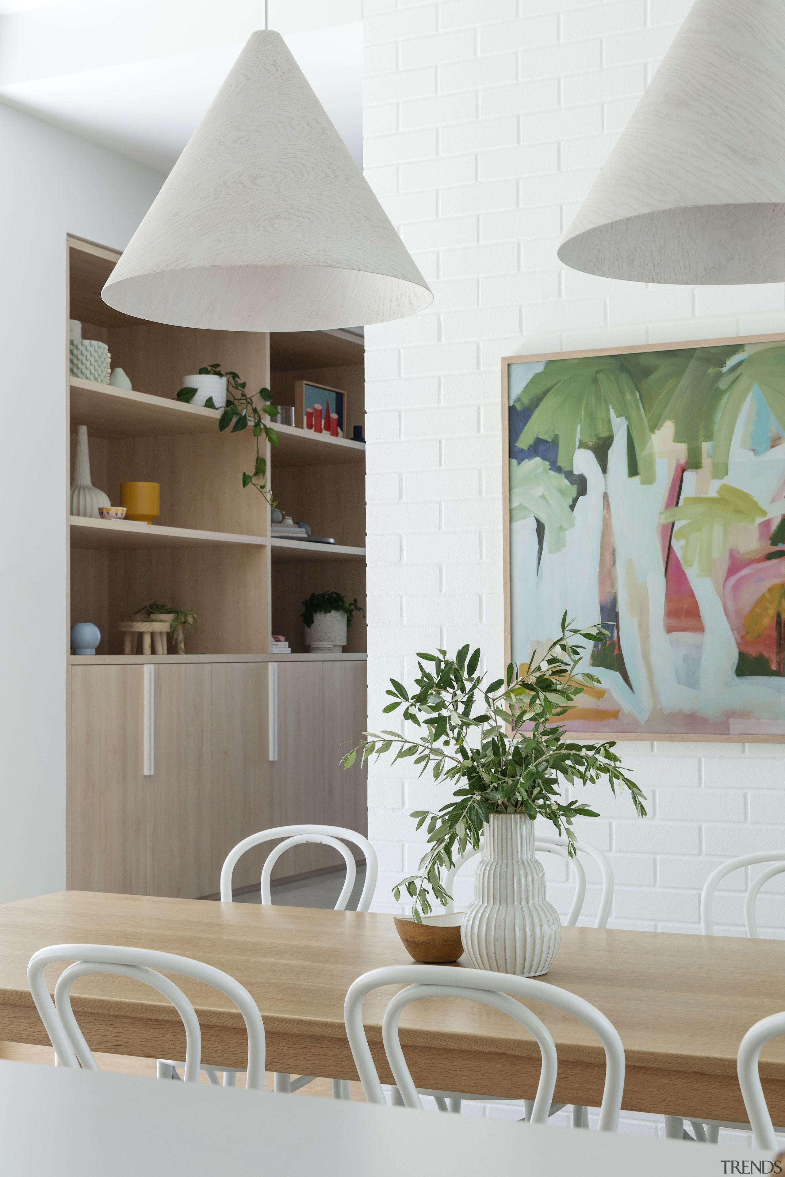 Dining area with built-in storage behind. - An 