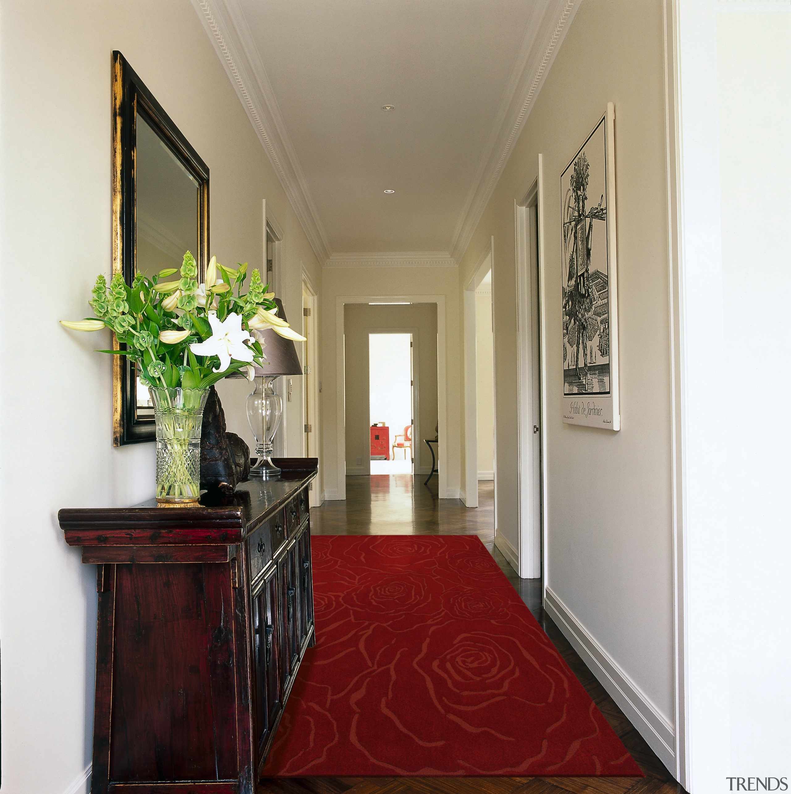 View of the hallway containing a wool rug ceiling, estate, floor, flooring, hall, hardwood, home, house, interior design, living room, property, real estate, room, wall, gray