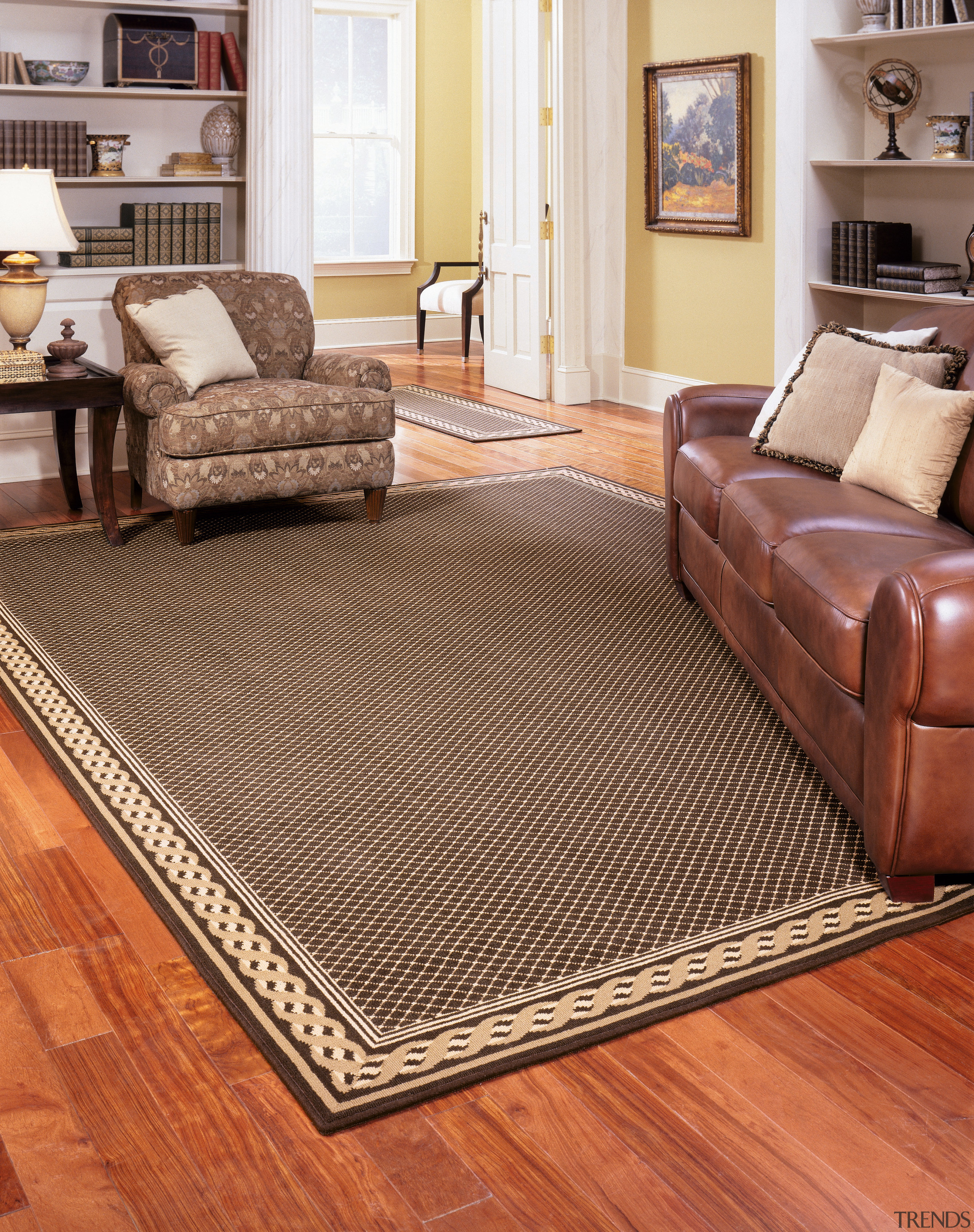 A view of some carpet from Glen Eden brown, carpet, coffee table, couch, floor, flooring, furniture, hardwood, laminate flooring, living room, loveseat, mat, table, wood, wood flooring, wood stain, brown, orange