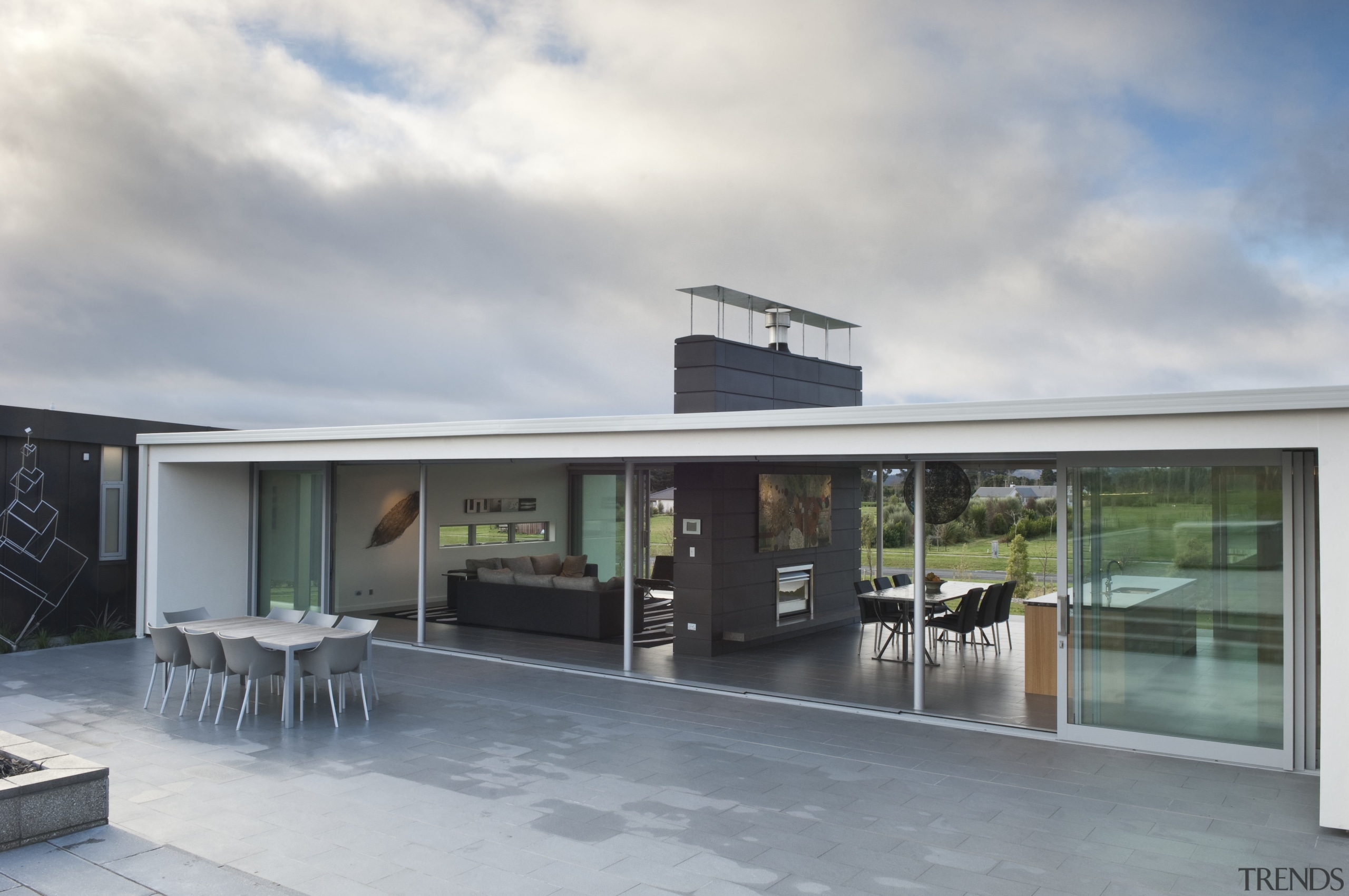 View of contemporary bach with terrace, sheltered courtyard architecture, house, real estate, roof, gray