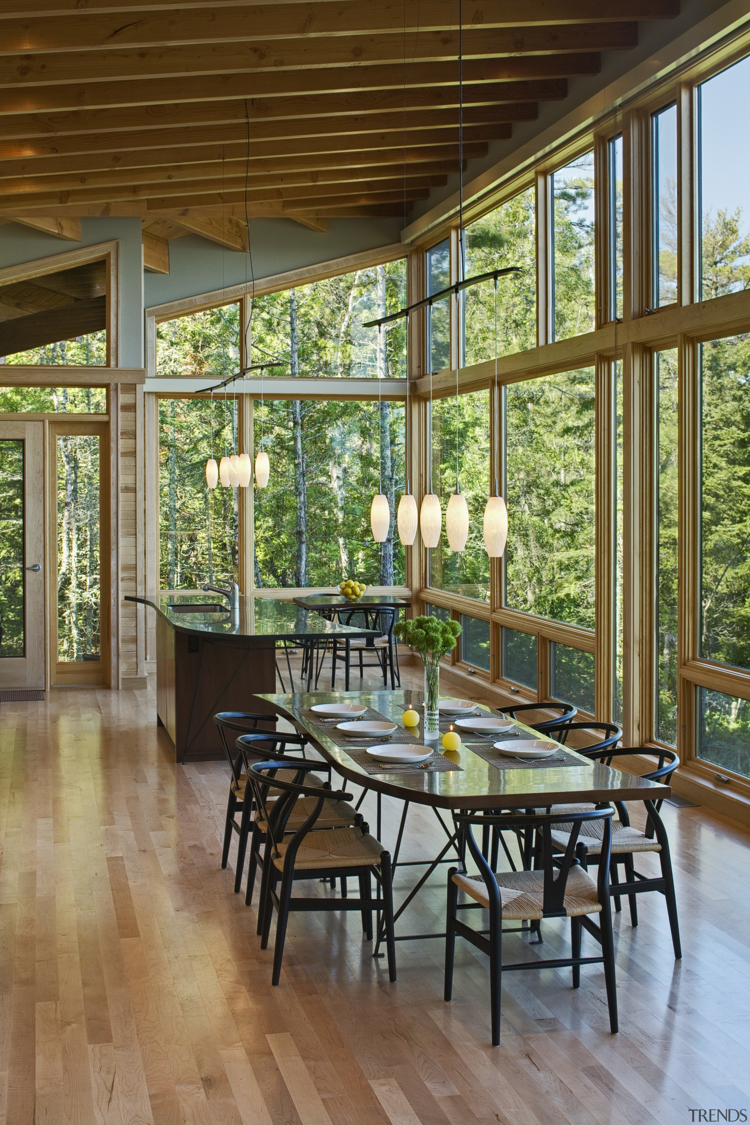 Full height glass windows showcase the cabins views architecture, daylighting, dining room, estate, hardwood, home, house, interior design, living room, outdoor structure, patio, porch, real estate, table, window, wood, wood flooring, brown