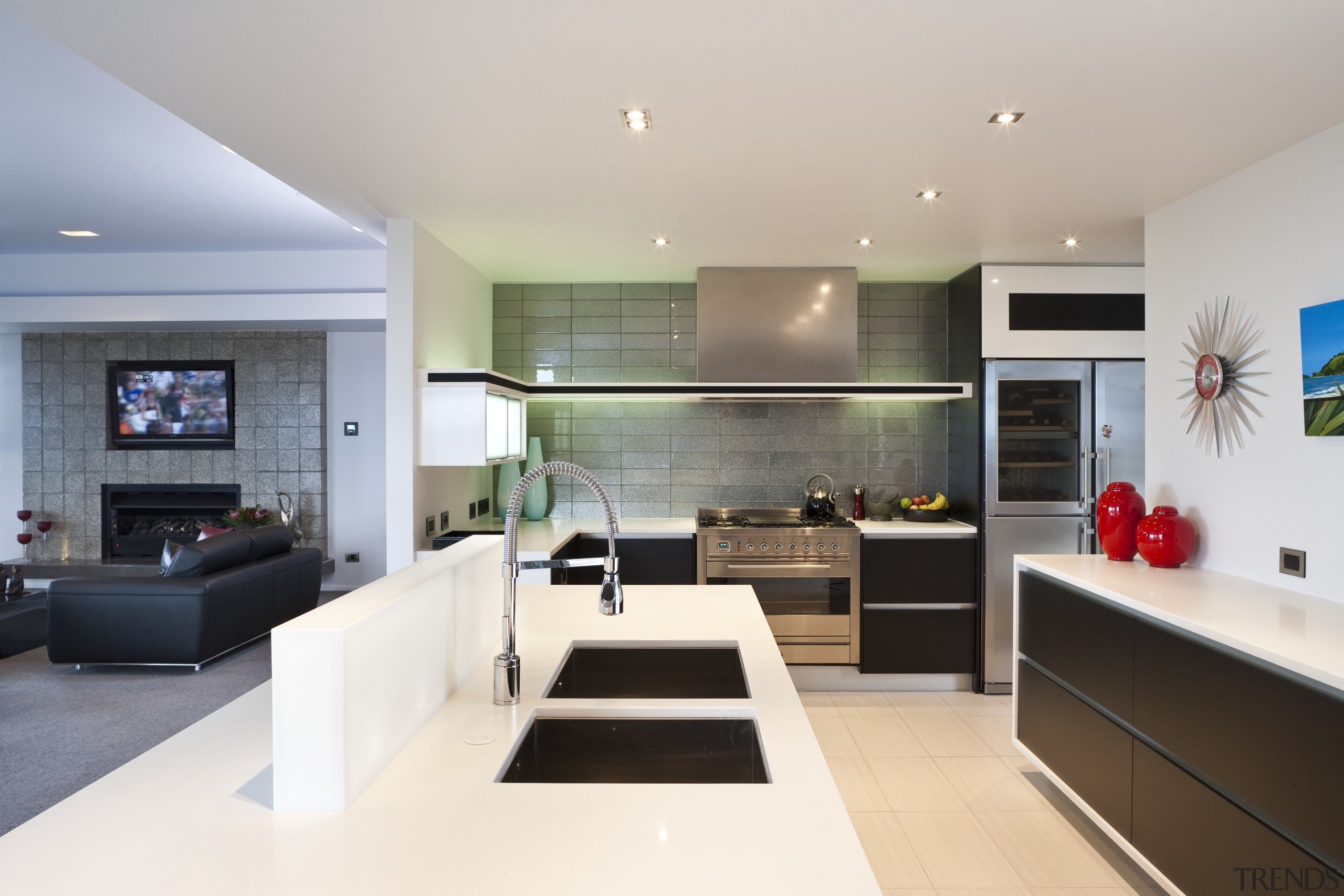 view of the open-plan kitchen area in a countertop, interior design, kitchen, living room, real estate, room, white, gray