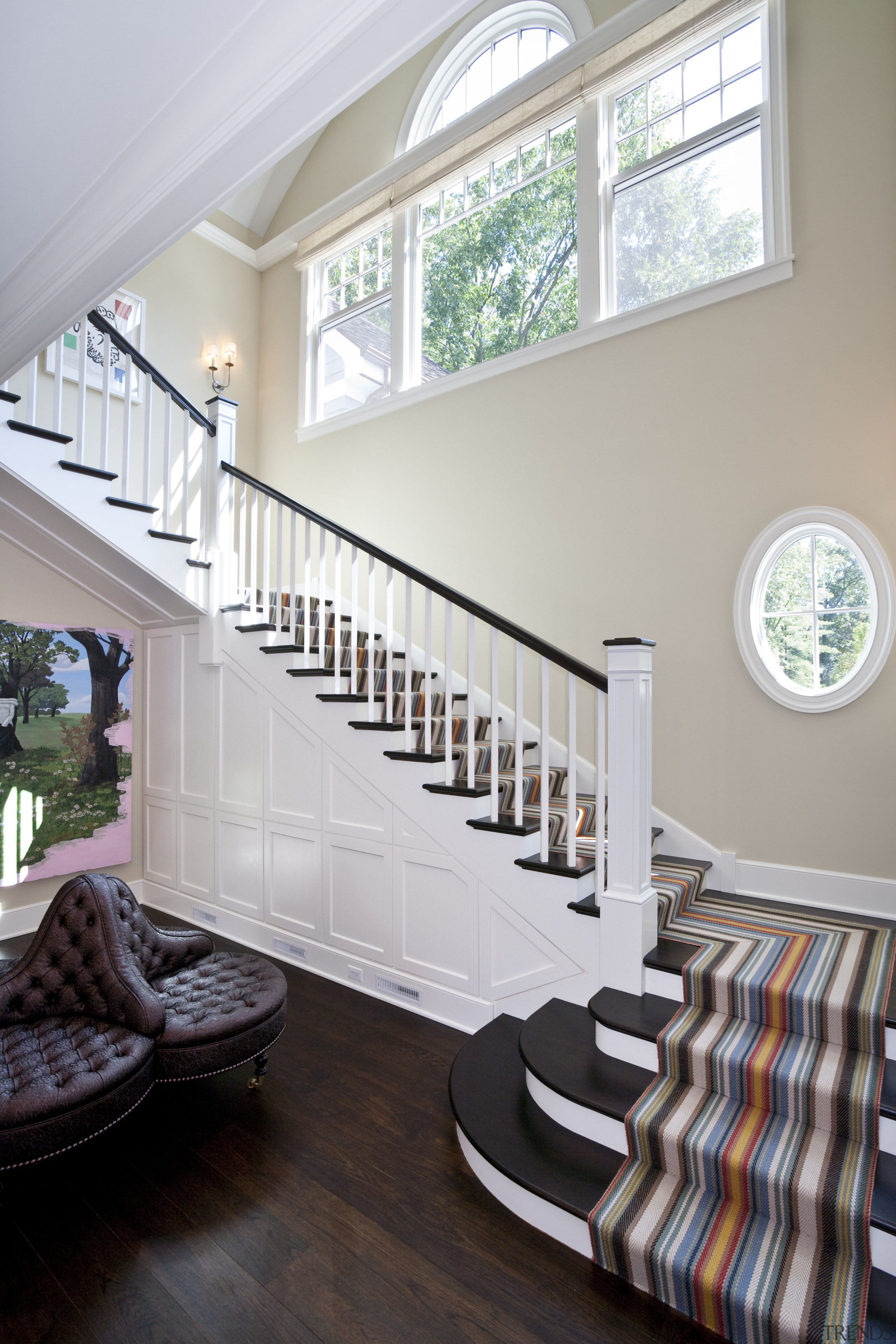 View of staircase. - View of staircase. - baluster, daylighting, estate, floor, flooring, handrail, hardwood, home, house, interior design, living room, real estate, room, stairs, structure, window, wood, gray