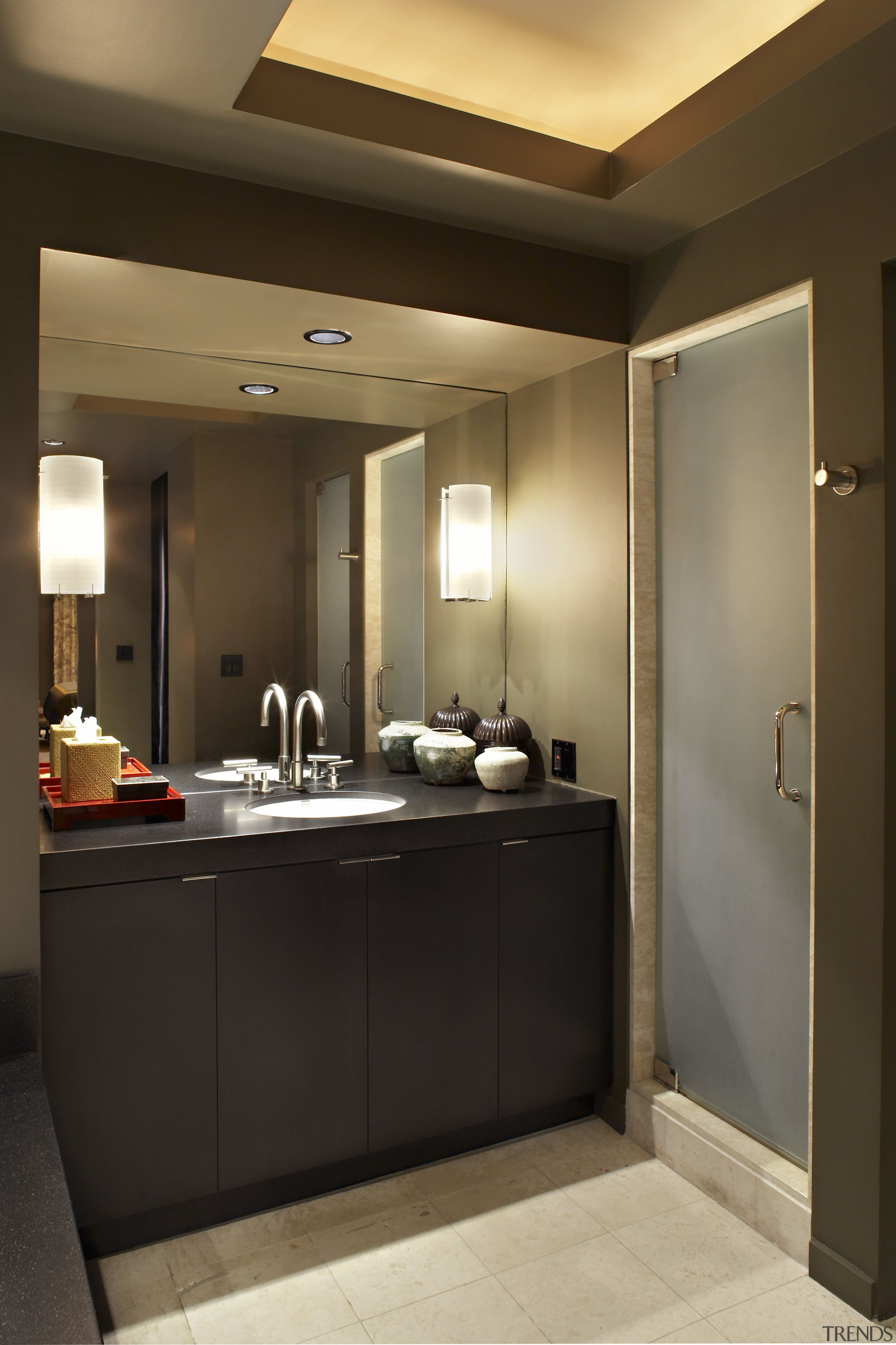 To the right of the vanity is the bathroom, cabinetry, ceiling, countertop, interior design, room, sink, brown