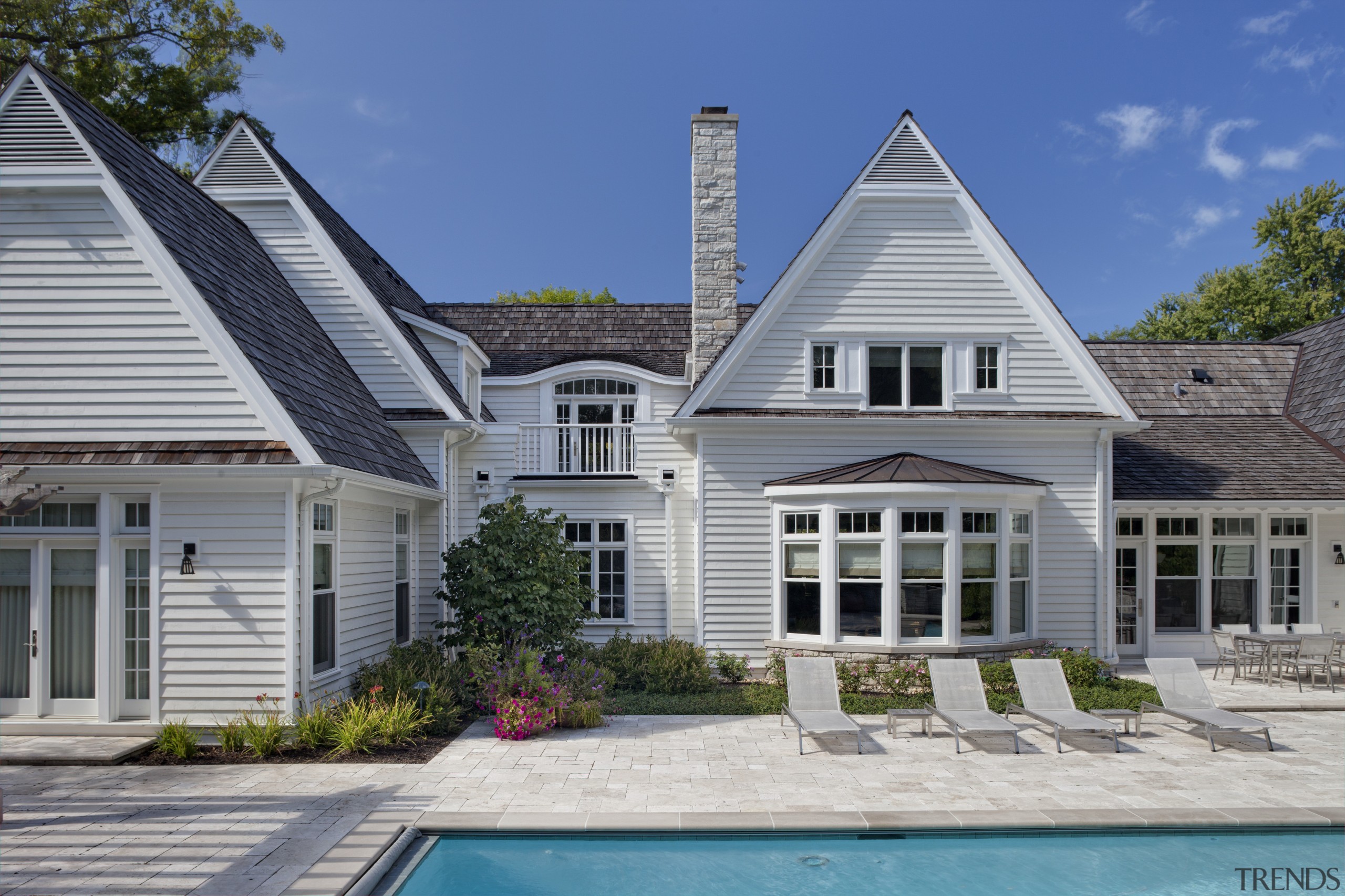 Exterior view of home with pool area. - building, cottage, elevation, estate, facade, farmhouse, home, house, mansion, property, real estate, residential area, roof, siding, villa, window, gray