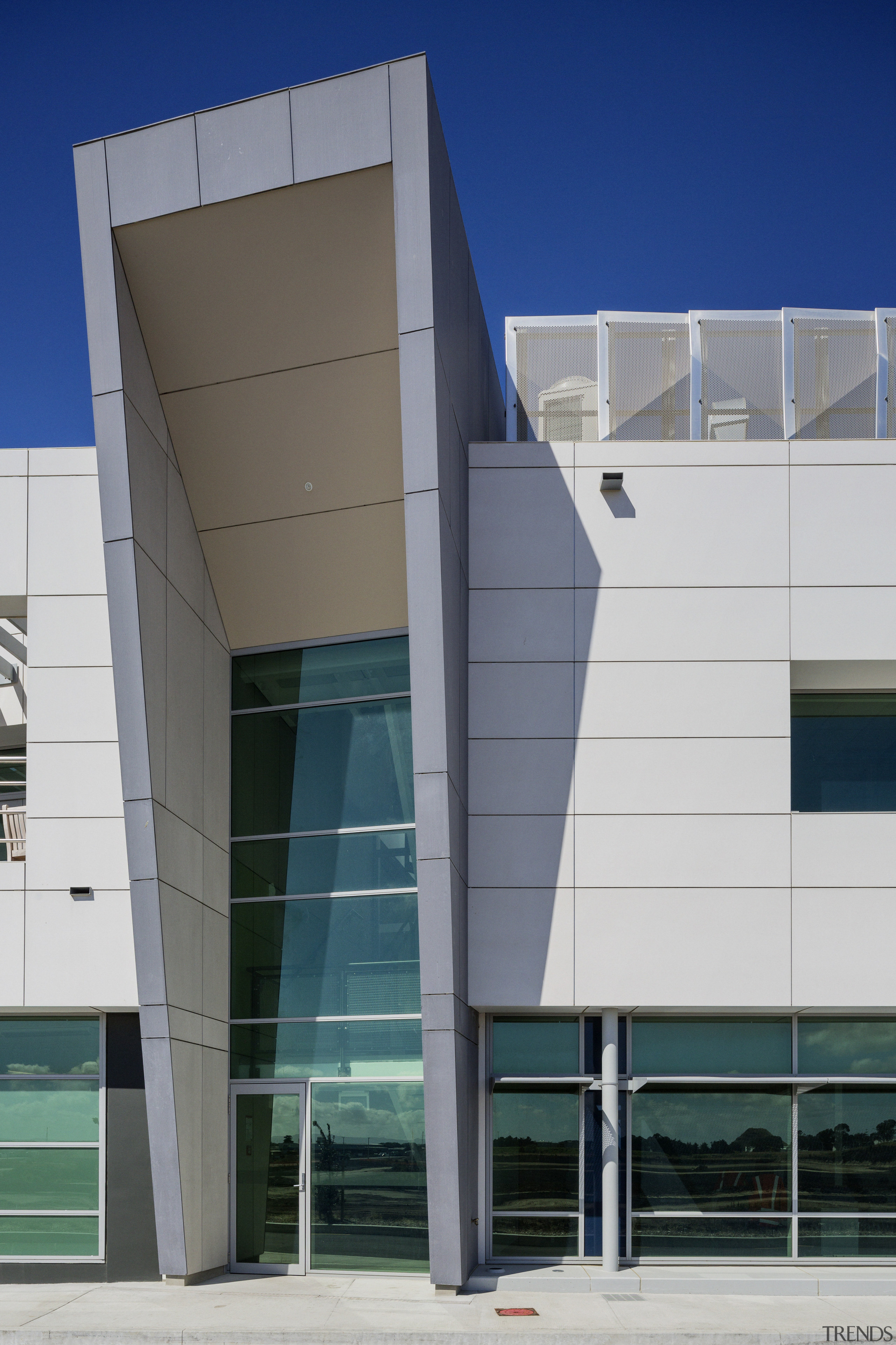 Dramatic double-height entry to high-tech Wiri Depot architecture, building, commercial building, corporate headquarters, daytime, elevation, facade, headquarters, house, line, residential area, structure, gray