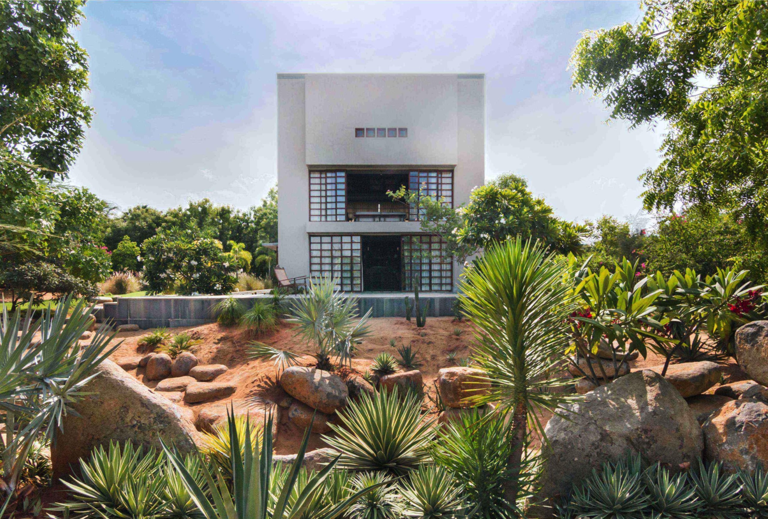 Niels Schoenfelder of Mancini Enterprises, Chennai arecales, estate, home, house, landscape, landscaping, palm tree, plant, property, real estate, resort, tree, vegetation, villa, brown