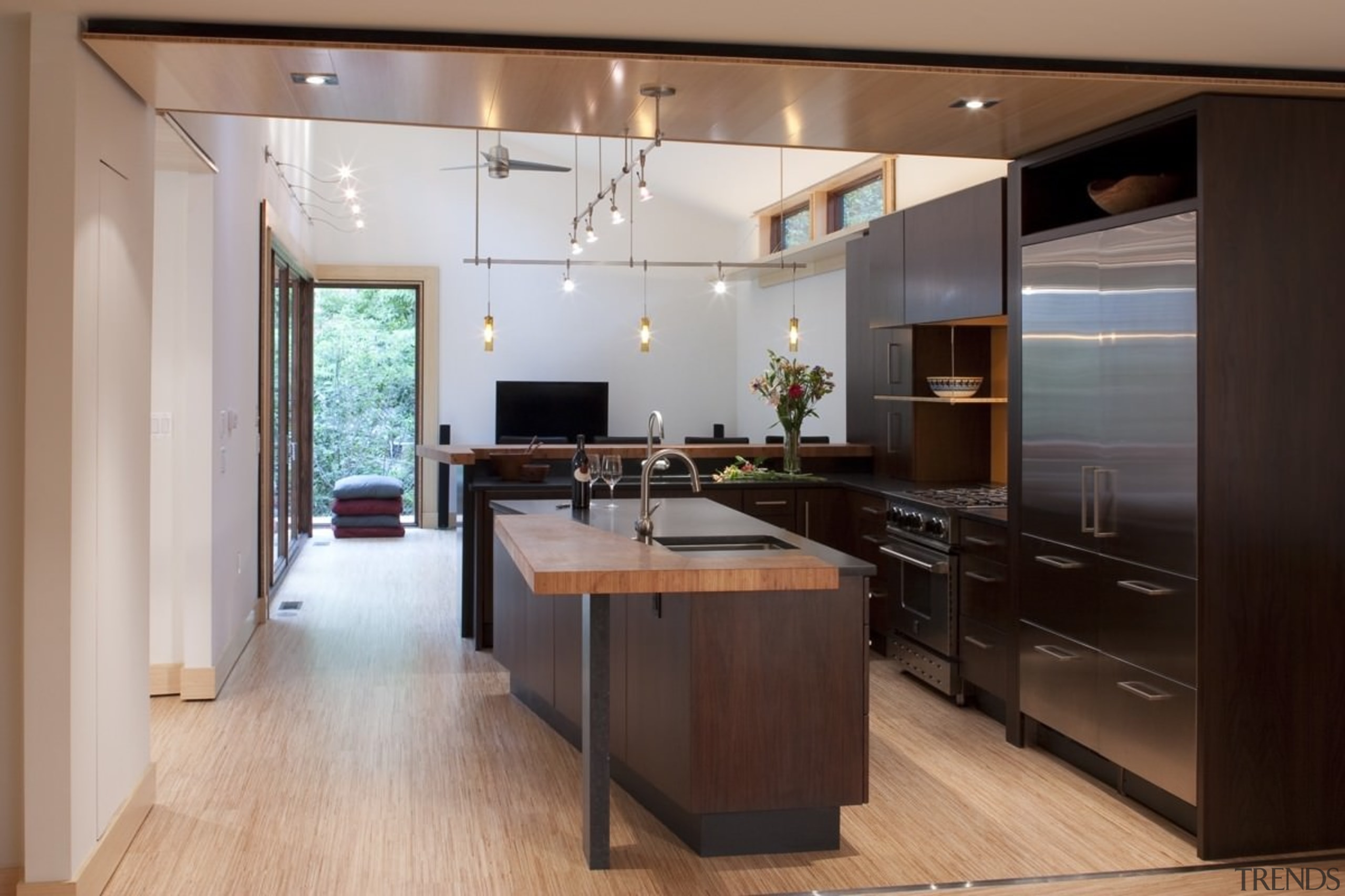 Every effort was made to make the new cabinetry, countertop, cuisine classique, floor, flooring, hardwood, interior design, kitchen, room, wood flooring, gray, black