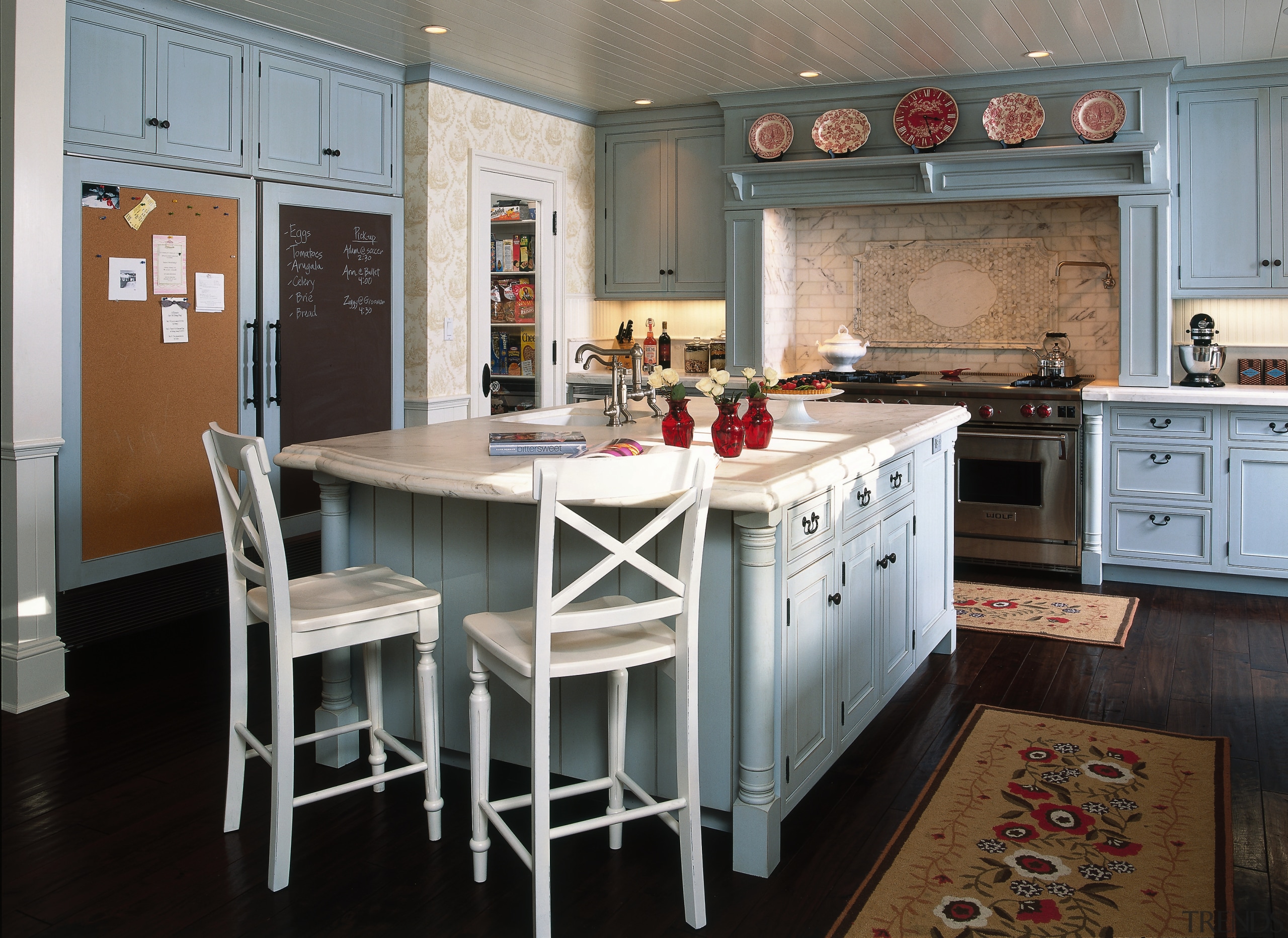 Classic Connecticut-style kitchen with elements of French chic cabinetry, countertop, cuisine classique, dining room, floor, flooring, hardwood, interior design, kitchen, room, table, wood flooring, gray, black