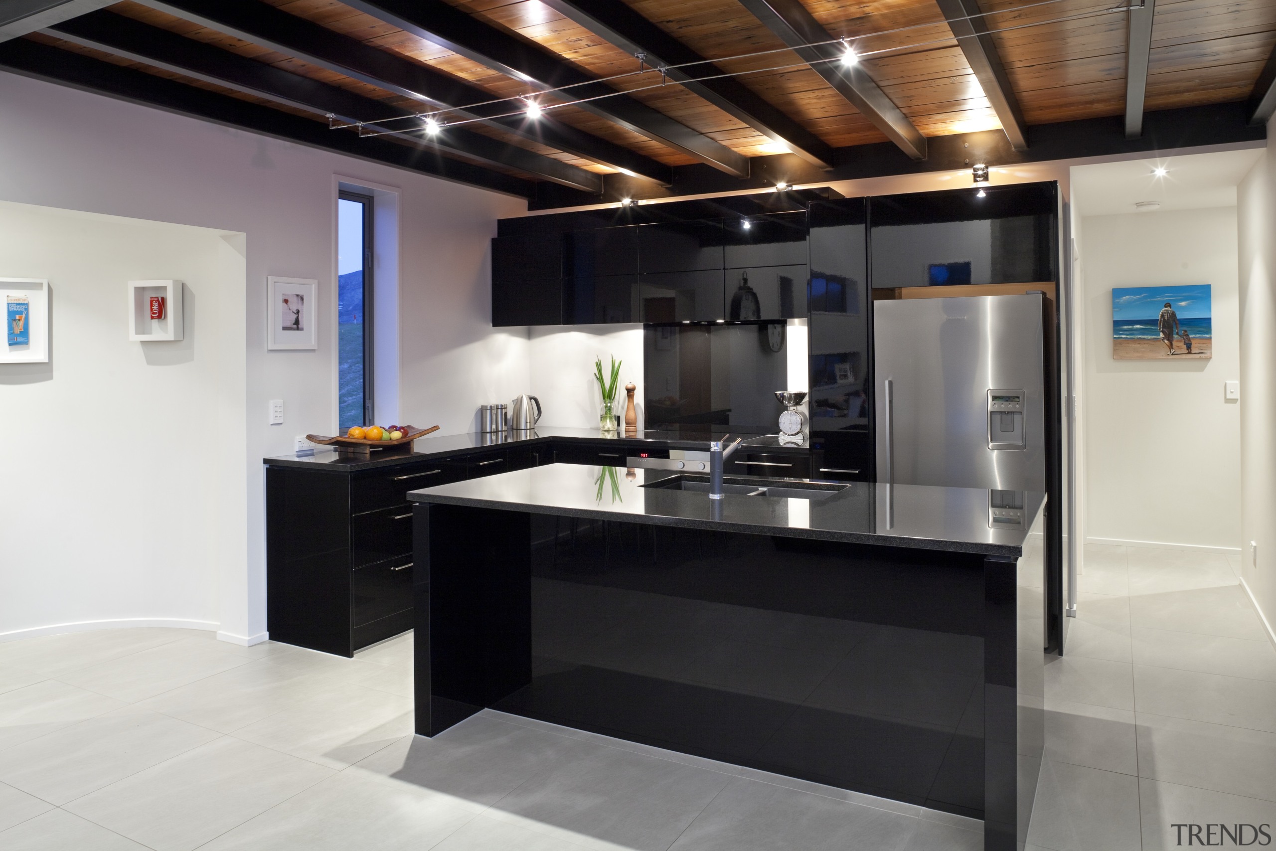 This kitchen, designed by the owner in conjunction countertop, interior design, kitchen, black, white