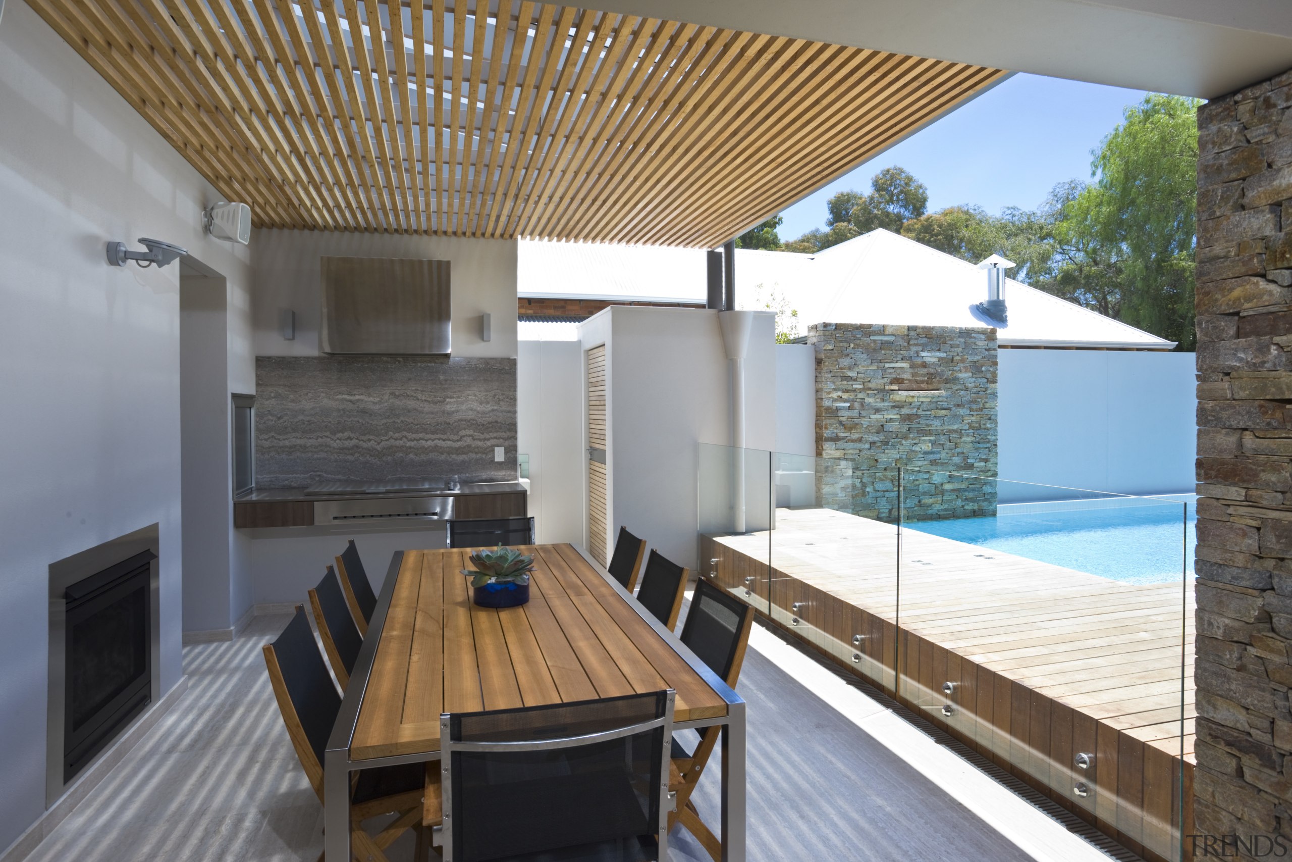 View of outdoor area which features decking, timber architecture, daylighting, house, interior design, property, real estate, roof, gray