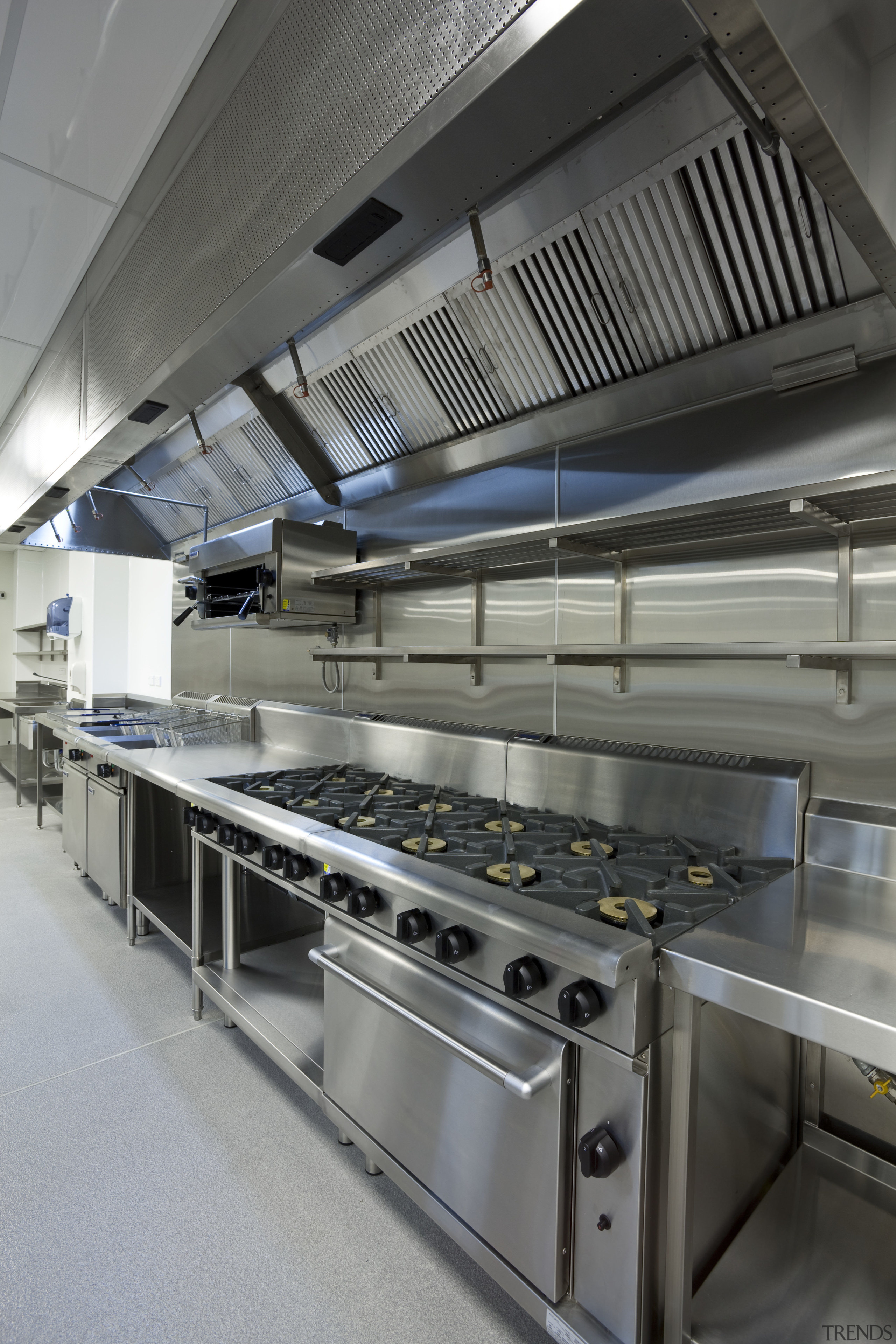 View of a kitchen at Eden Park which kitchen, gray, black