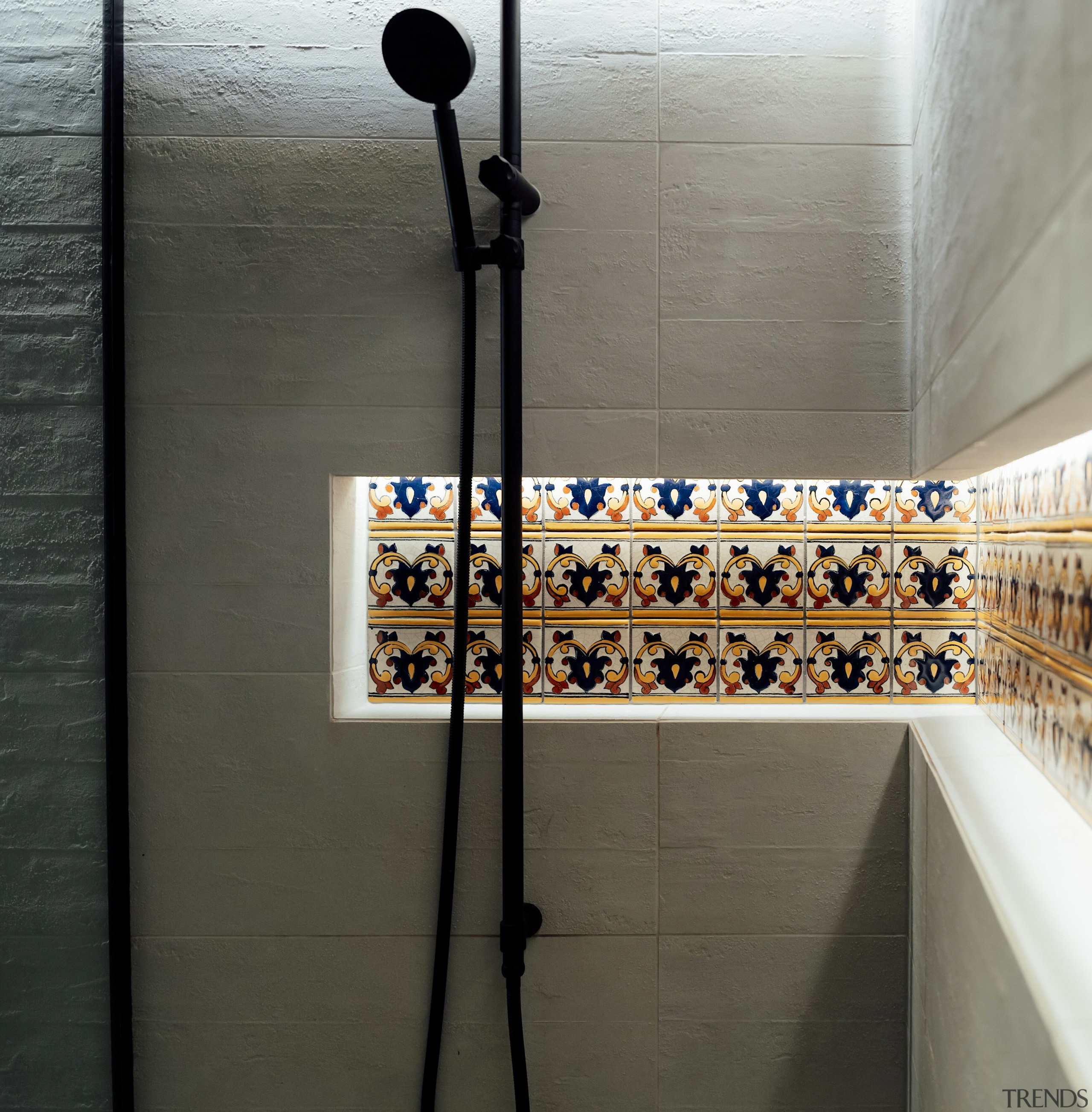 Concealed lighting highlights the colourful Mexican tiles in 