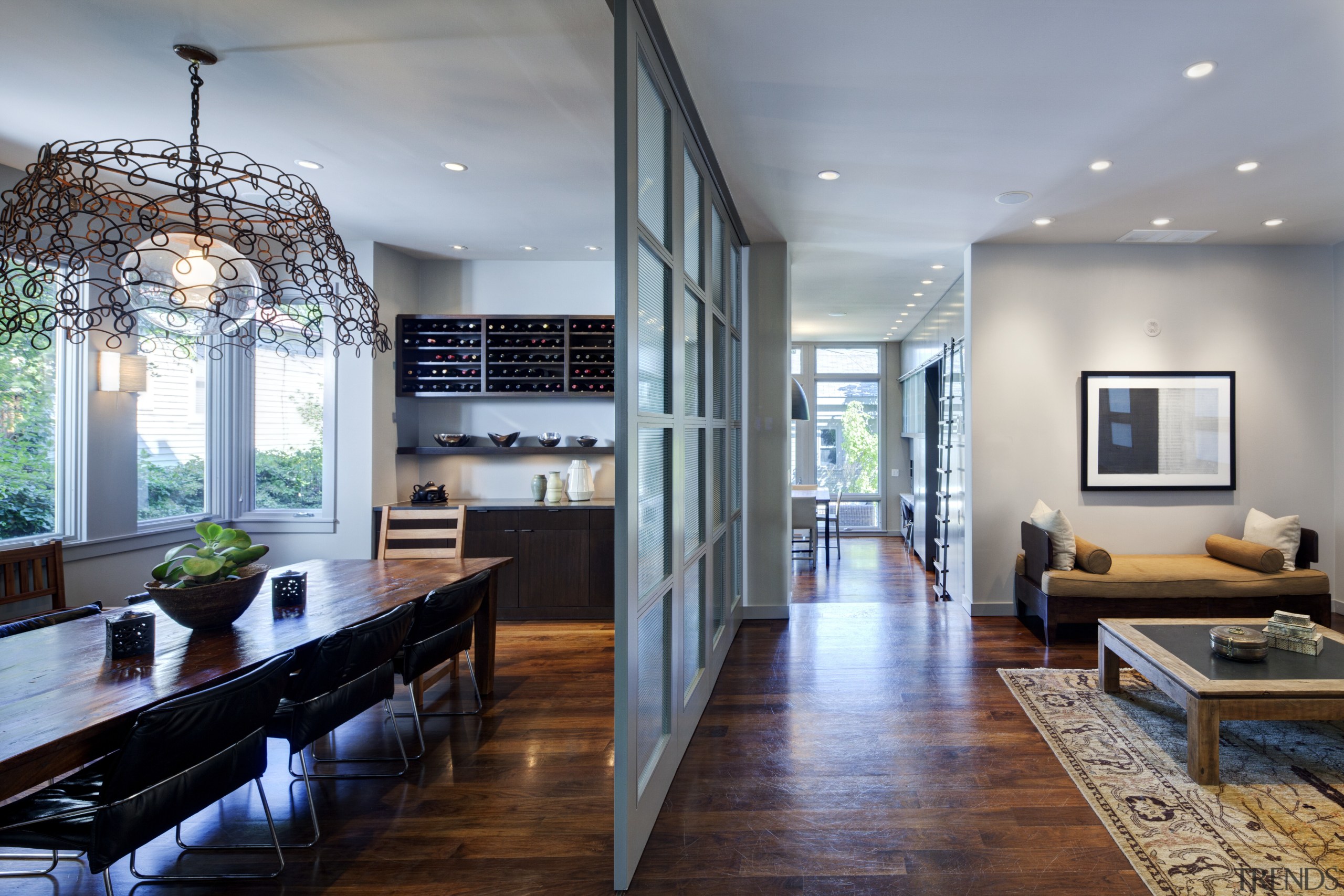 Sliding steel and glass panels separate the dining ceiling, house, interior design, living room, real estate, gray