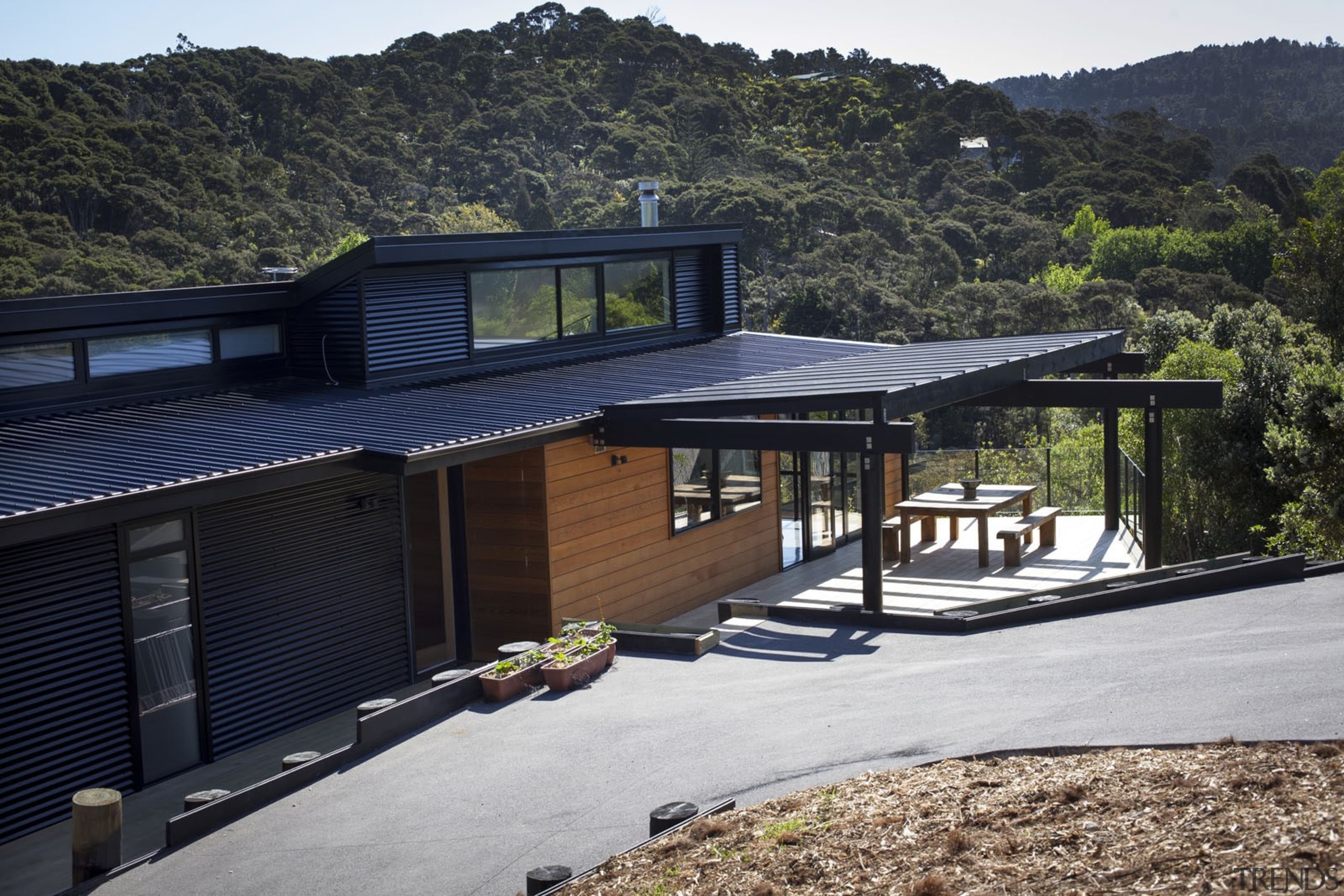 WaitakereHouse1 - Waitakere House 1 - architecture | architecture, cottage, home, house, landscape, property, real estate, roof, siding, black